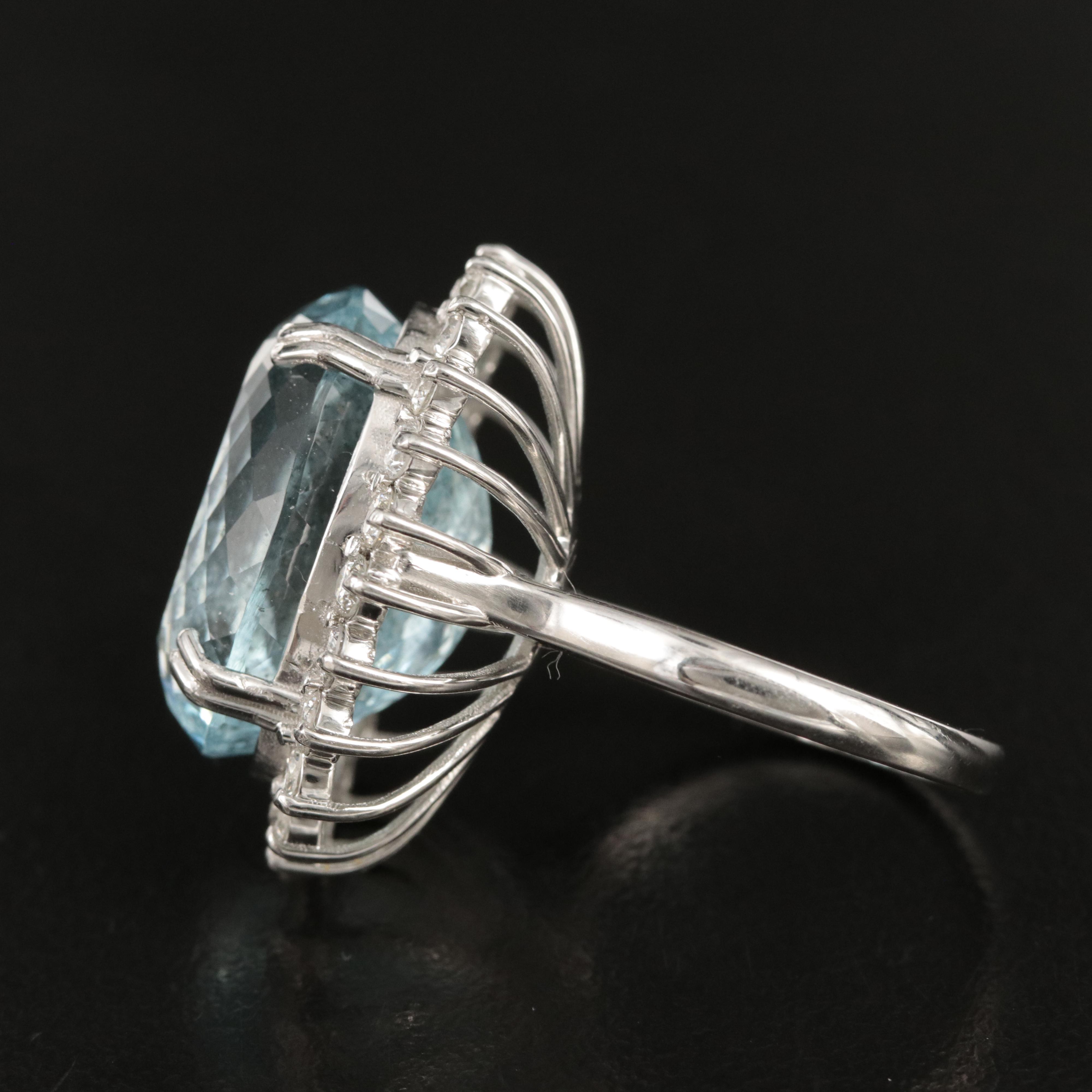 Platinum 16.17 CT Aquamarine and 1.20 CTW Diamond Halo Ring
