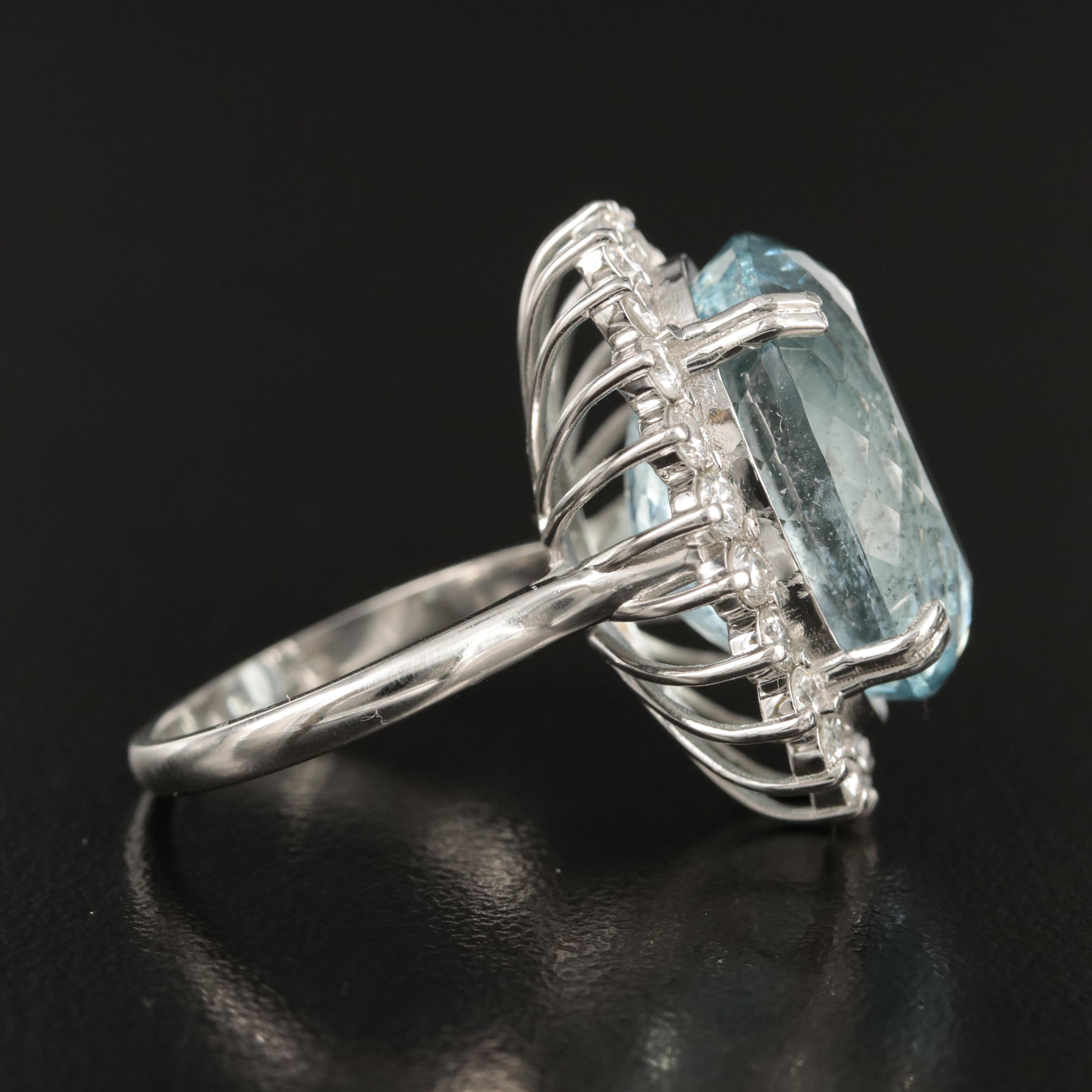 Platinum 16.17 CT Aquamarine and 1.20 CTW Diamond Halo Ring