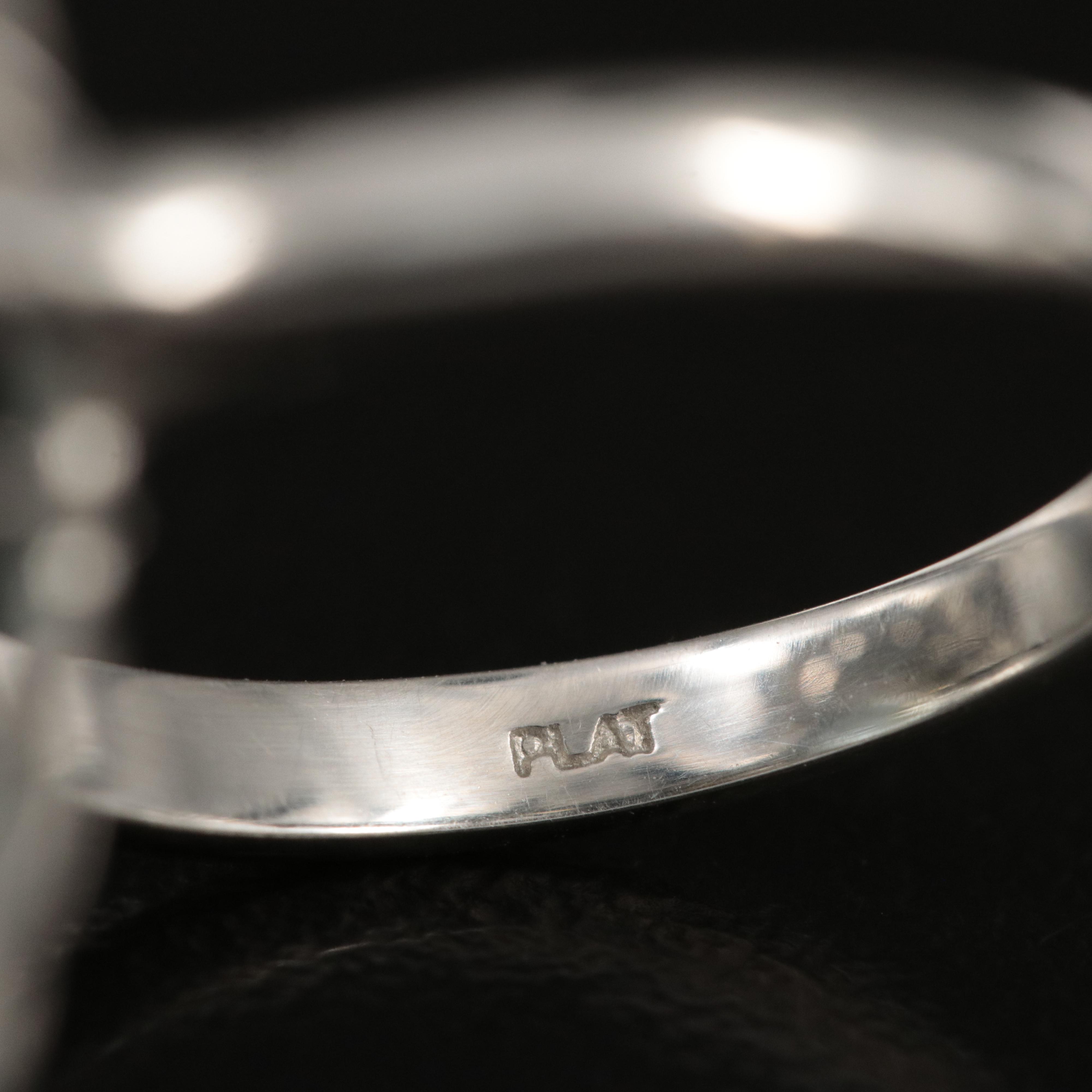 Platinum 16.17 CT Aquamarine and 1.20 CTW Diamond Halo Ring