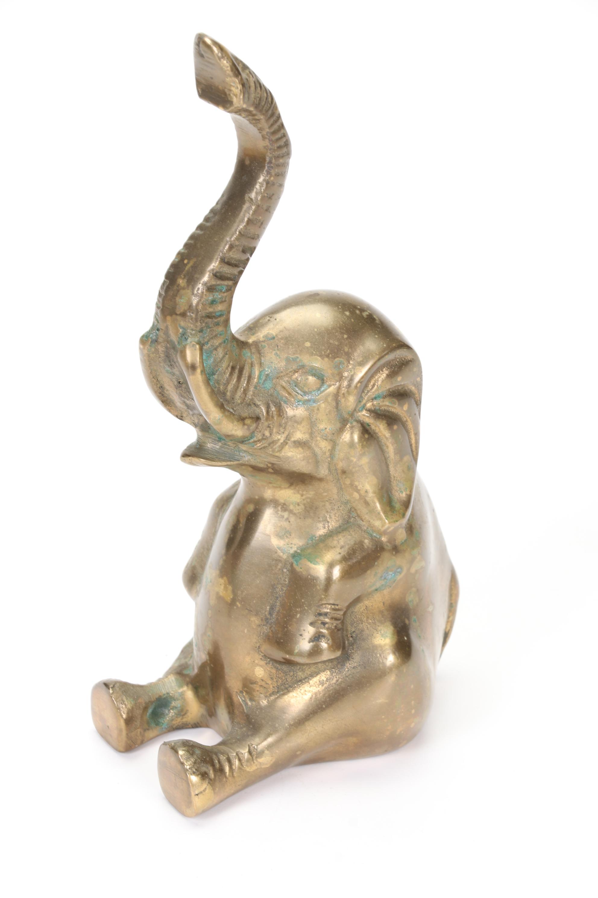 Round Brass Box, Elephant Claw Bell, and Sitting Elephant Figurine