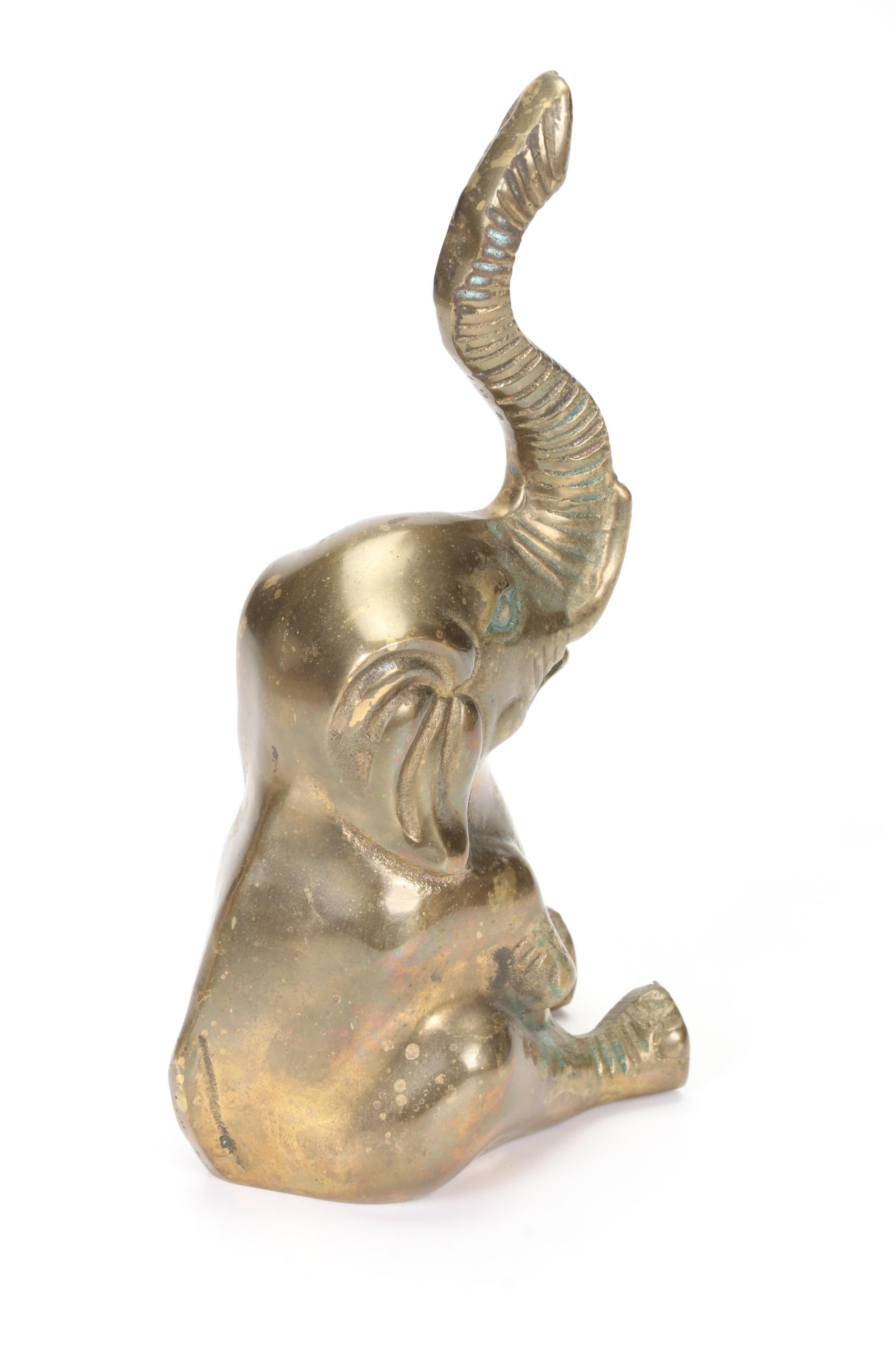 Round Brass Box, Elephant Claw Bell, and Sitting Elephant Figurine
