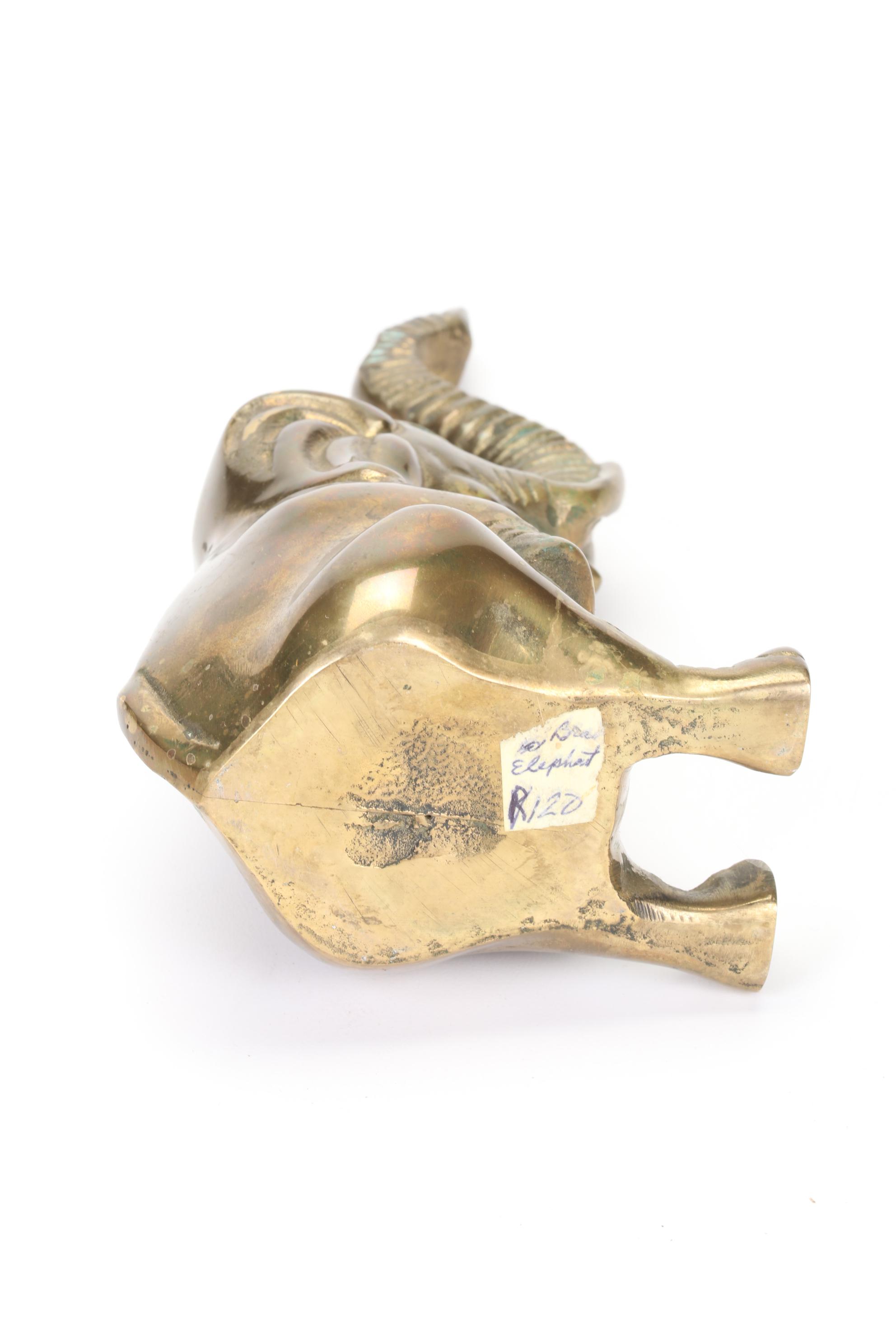 Round Brass Box, Elephant Claw Bell, and Sitting Elephant Figurine