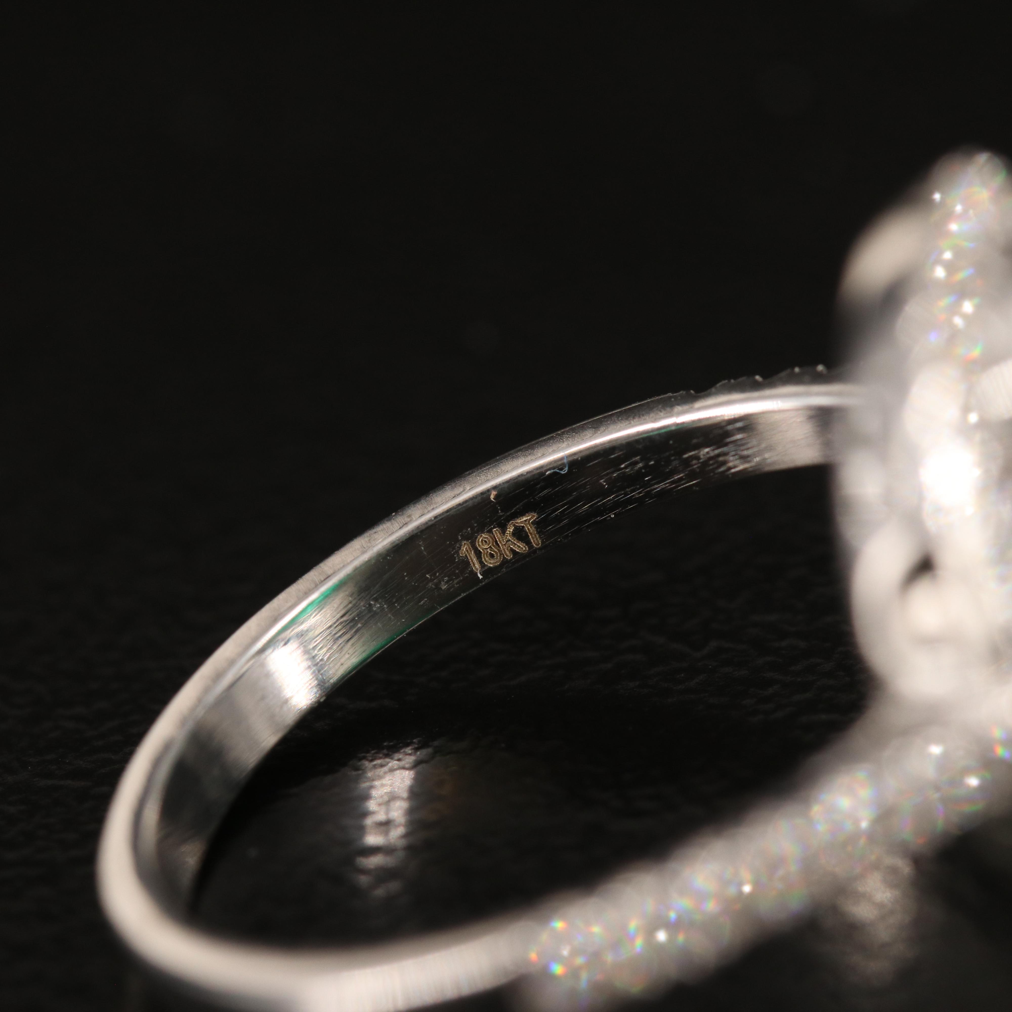 18K 4.67 CT Emerald and Diamond Ring