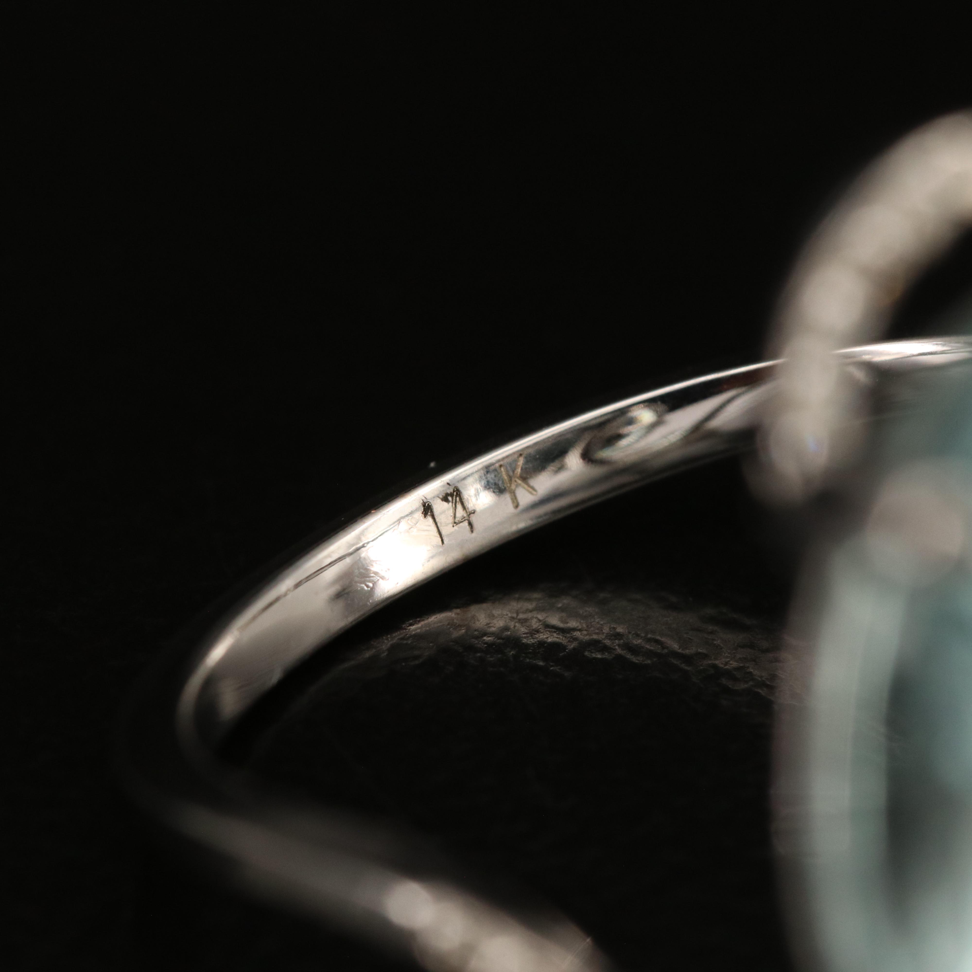 14K 12.25 CT Aquamarine and Diamond Ring
