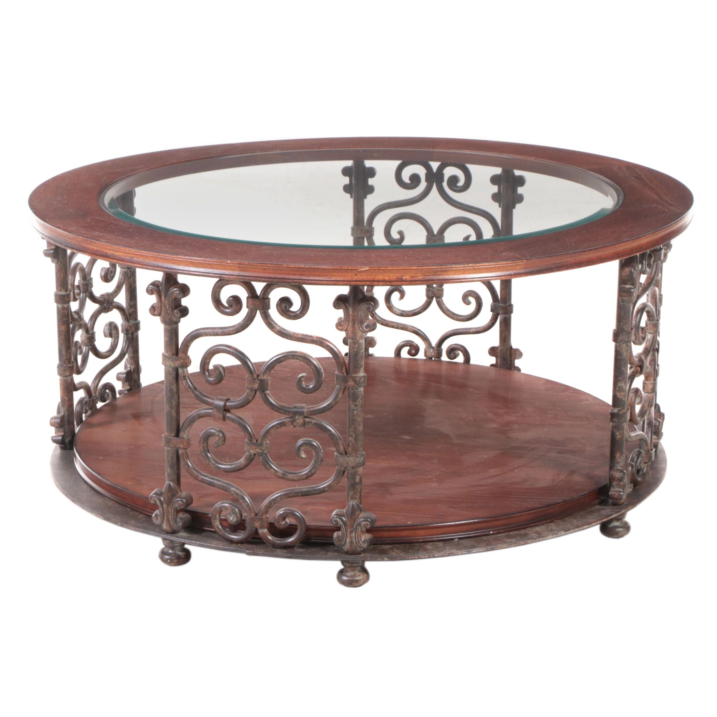 Baroque Style Patinated Iron, Hardwood, and Glass Top Two-Tier Coffee Table