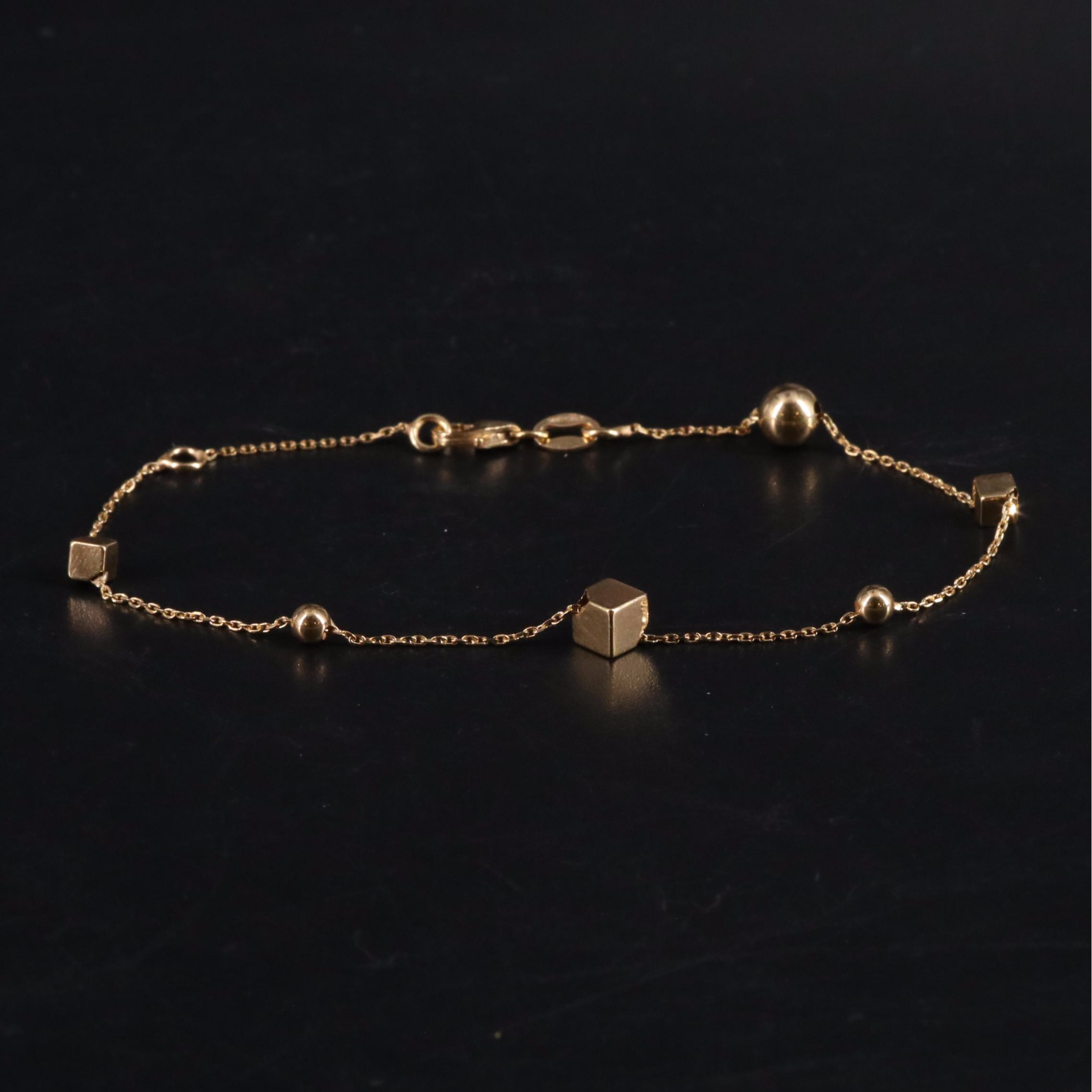 14K Bracelet with Stationary Shapes