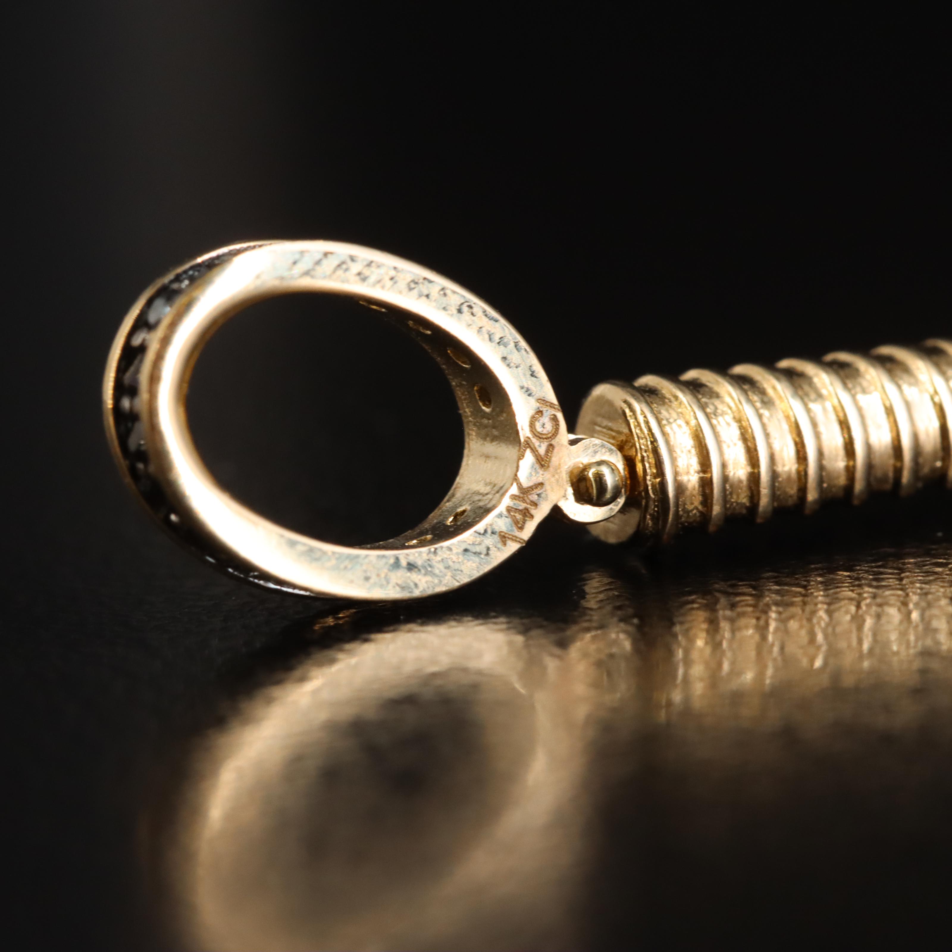 14K Spinel Battle Axe Pendant