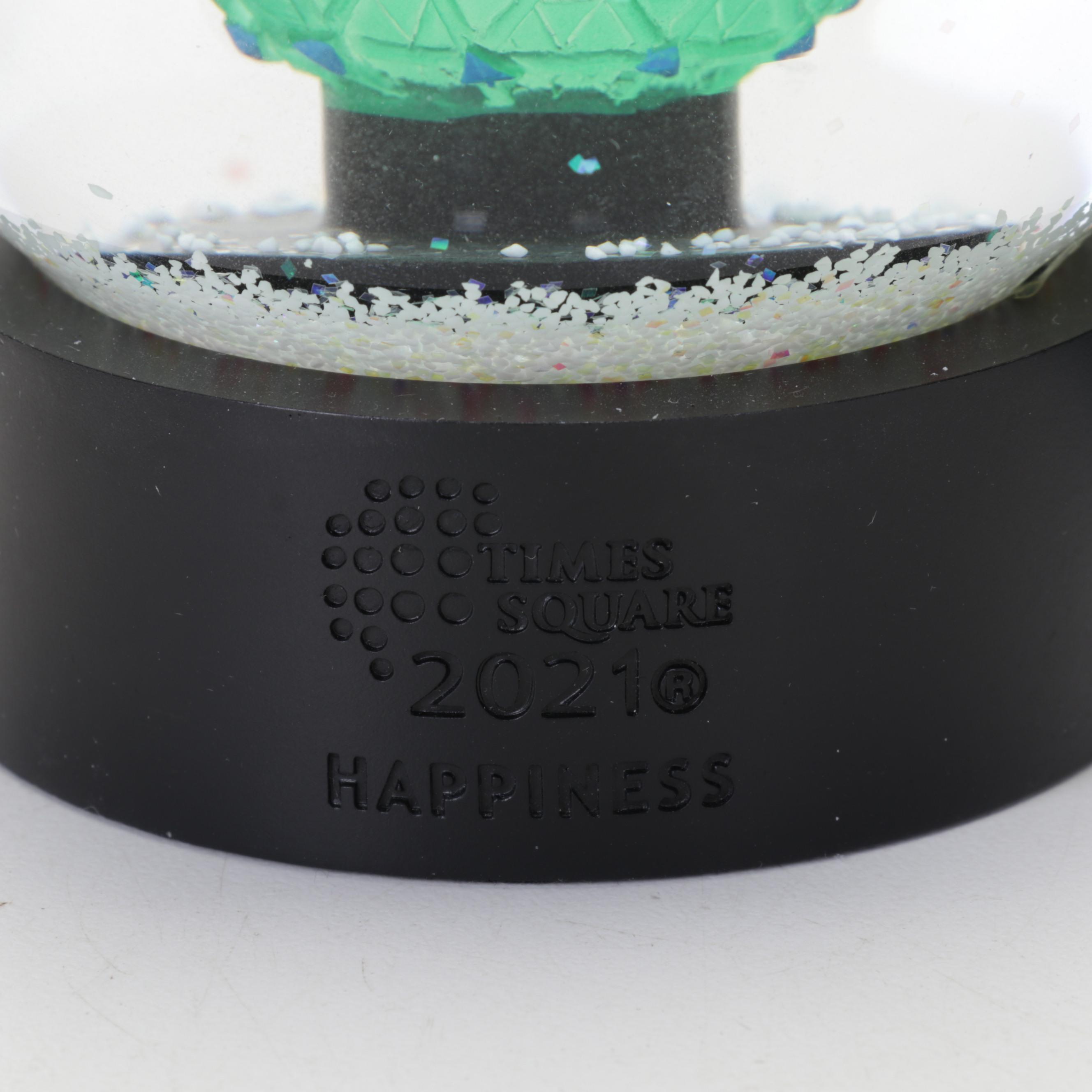 Waterford Crystal, Neiman Marcus, Coach and More Snow Globes