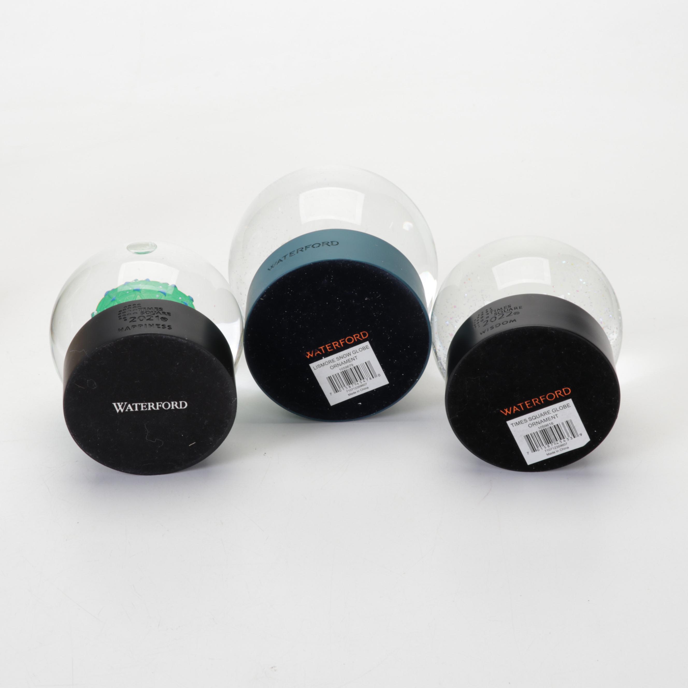 Waterford Crystal, Neiman Marcus, Coach and More Snow Globes