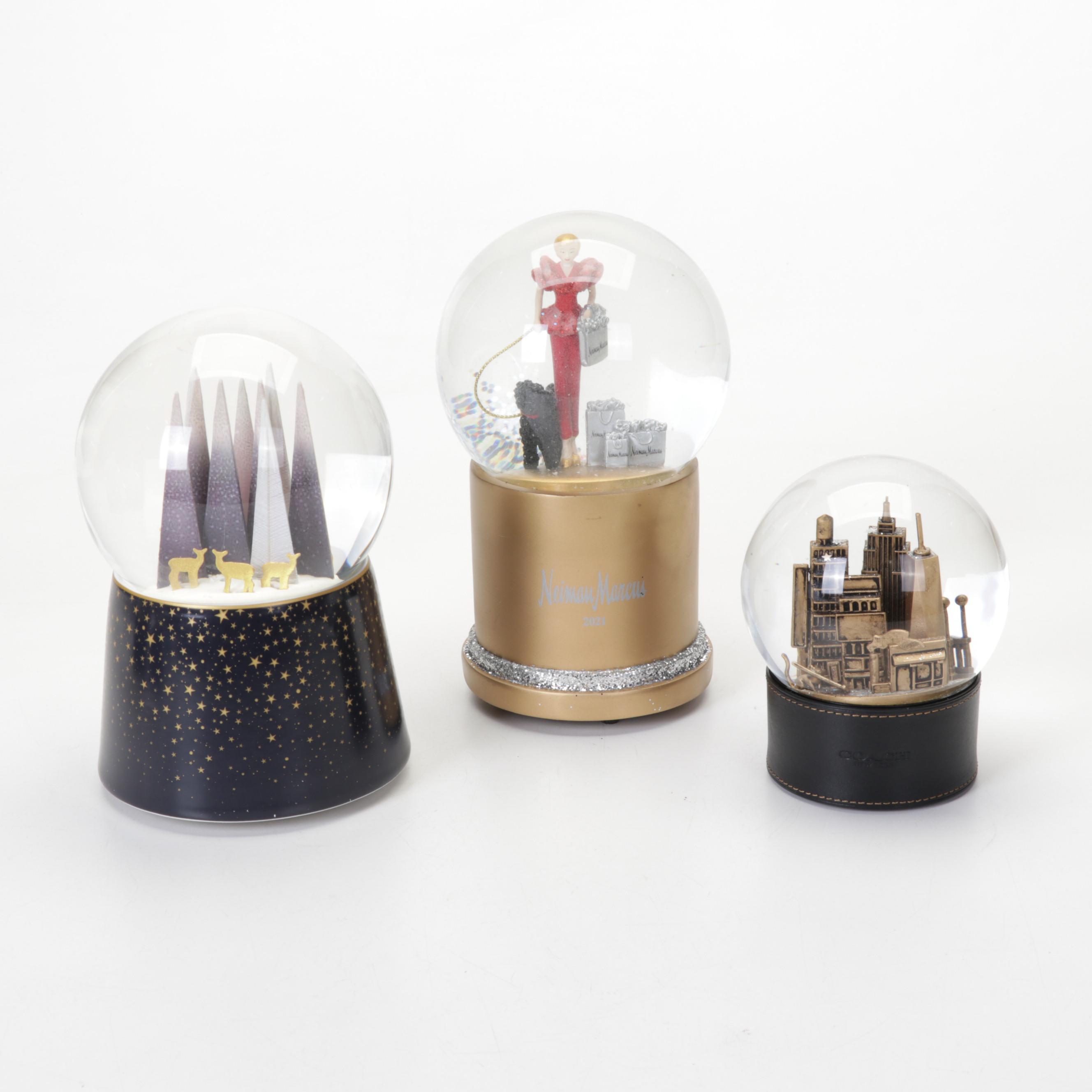 Waterford Crystal, Neiman Marcus, Coach and More Snow Globes