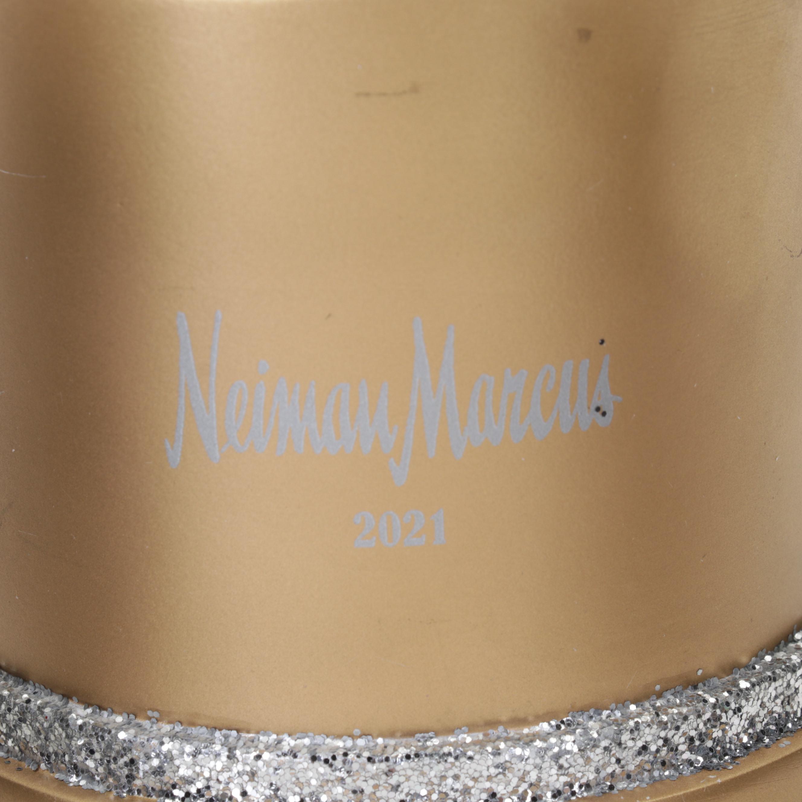 Waterford Crystal, Neiman Marcus, Coach and More Snow Globes