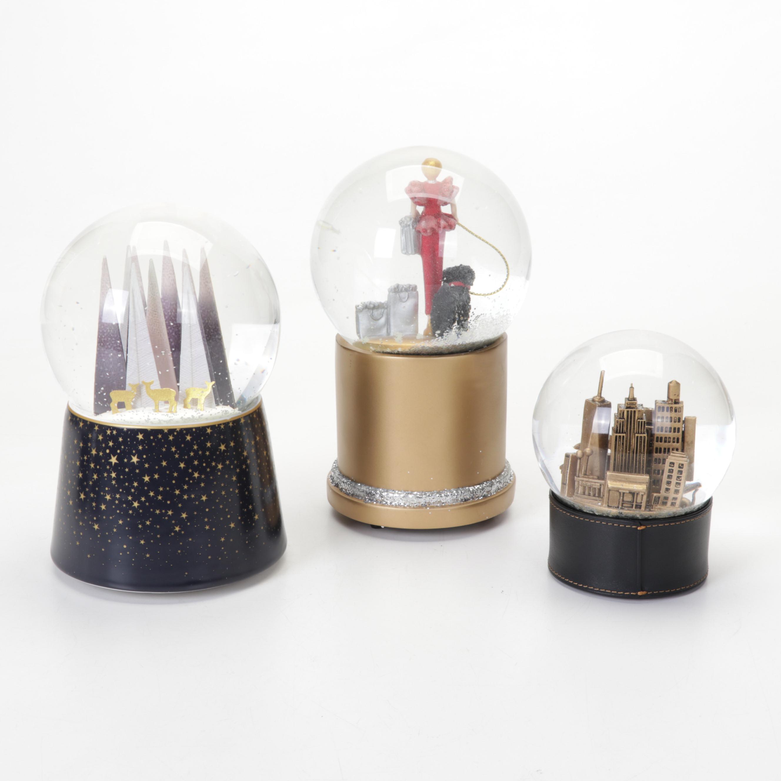 Waterford Crystal, Neiman Marcus, Coach and More Snow Globes