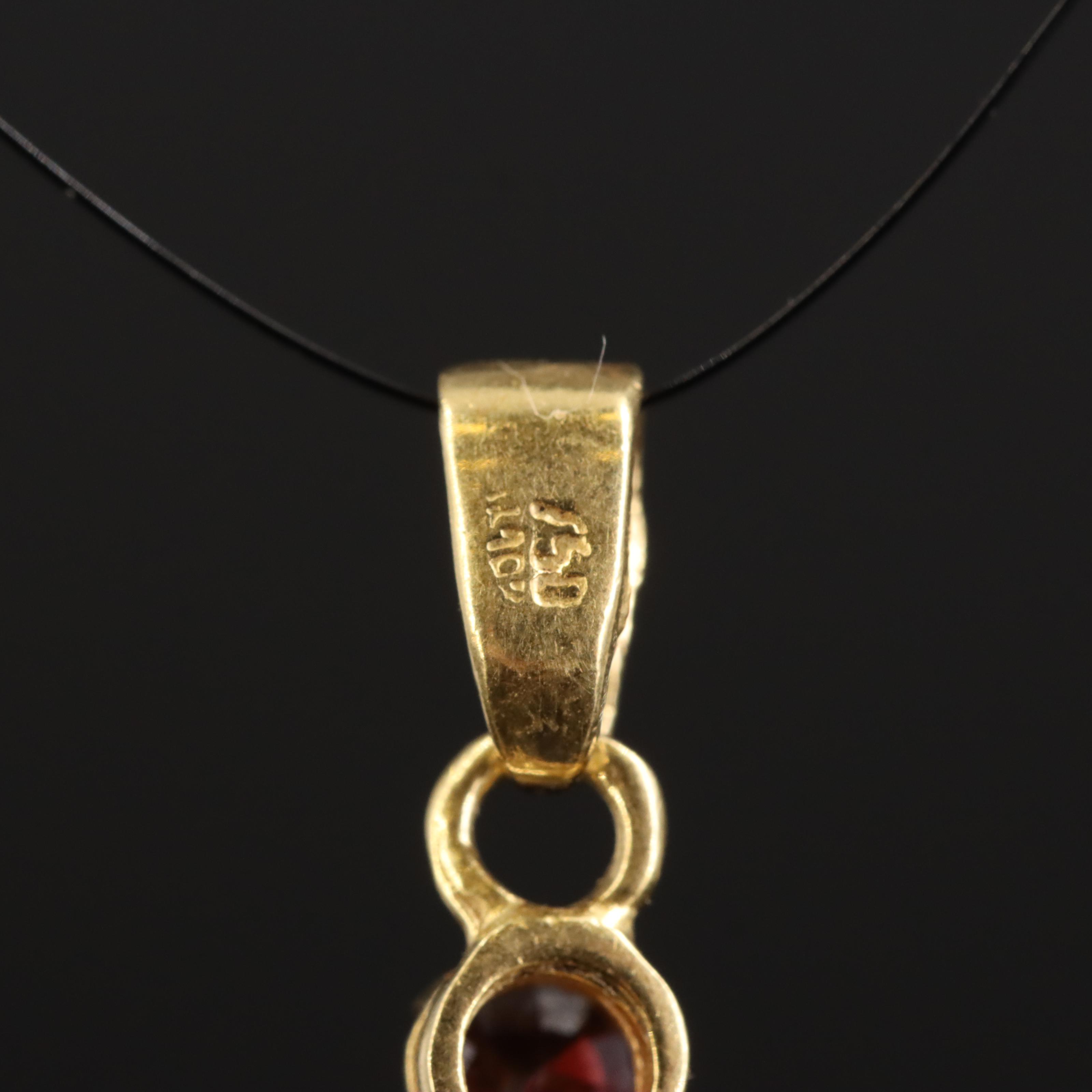 18K Garnet Cross Pendant