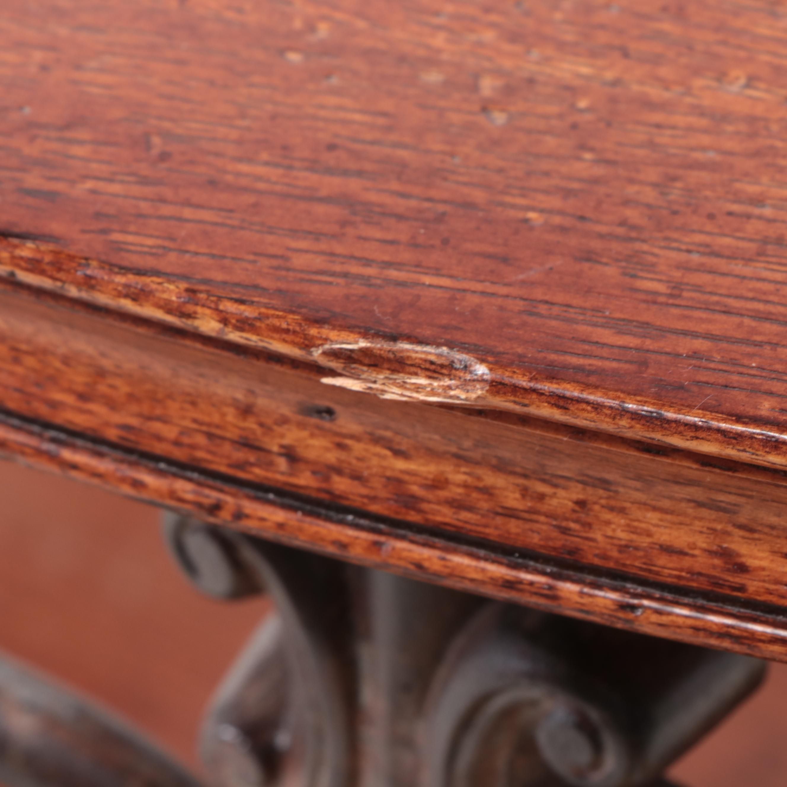 Baroque Style Patinated Iron, Hardwood, and Glass Top Two-Tier Coffee Table