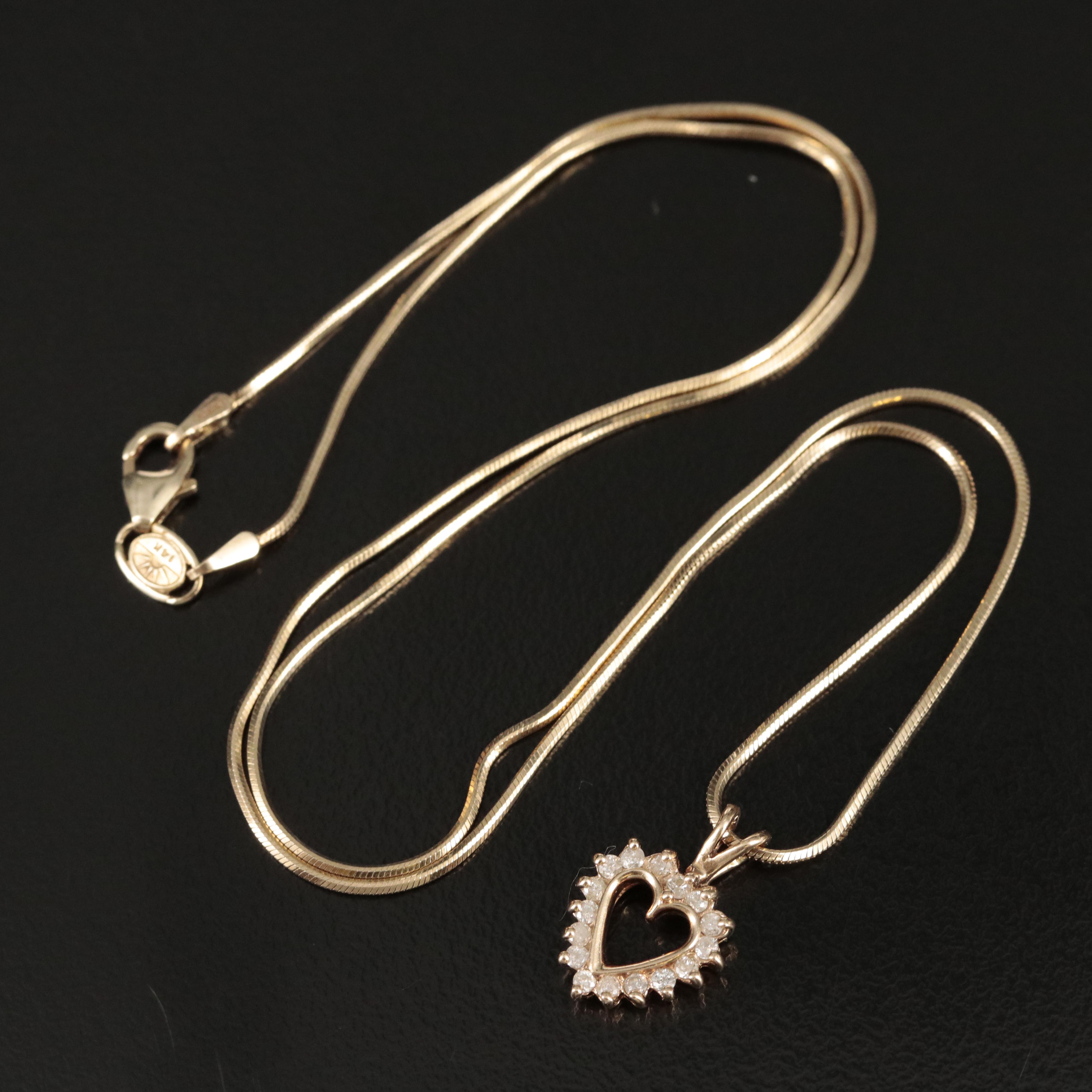 14K 0.28 CTW Diamond Heart Pendant on Round Snake Chain