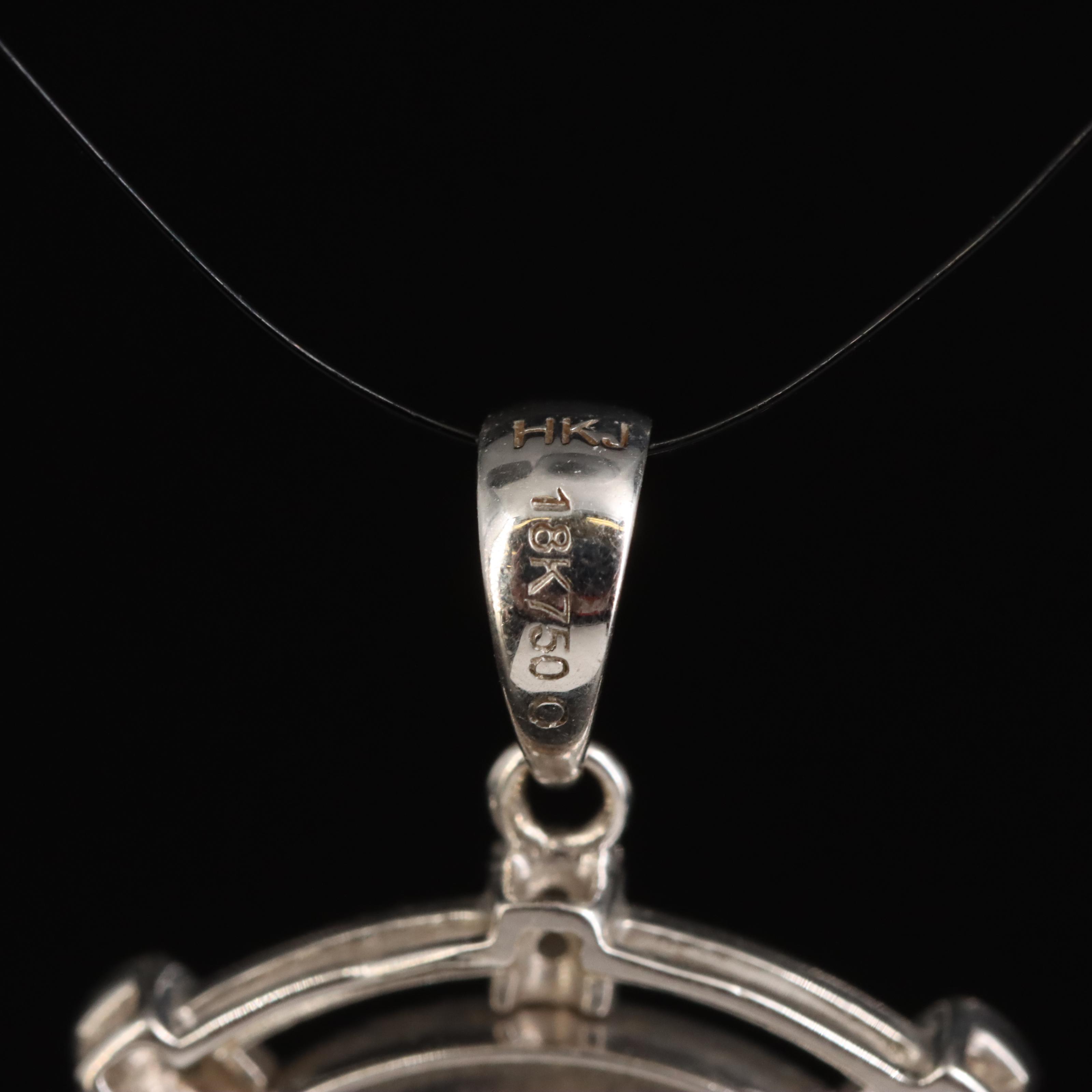 18K Two-Tone 0.16 CTW Diamond Pendant with Articulating Pinwheel