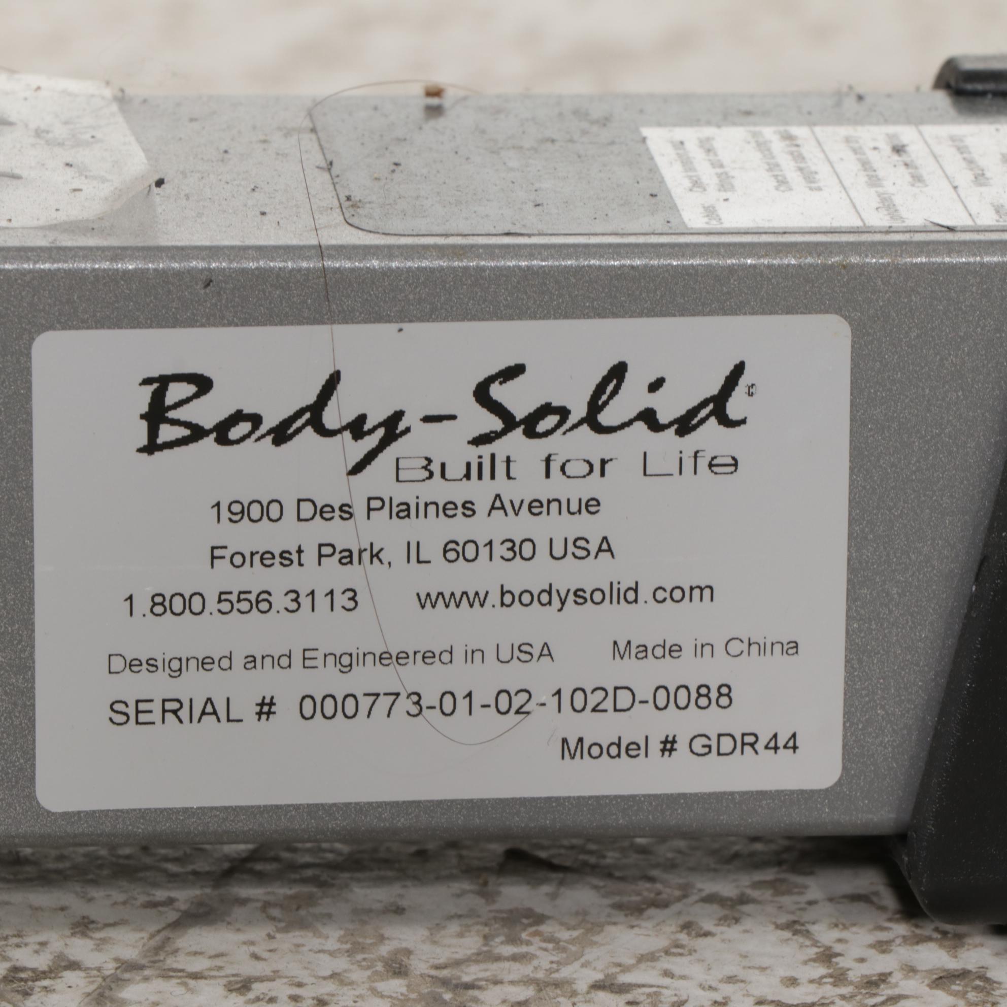 Fitness Equipment with Body Solid Weight Rack, Medicine Balls, Boxing Gloves