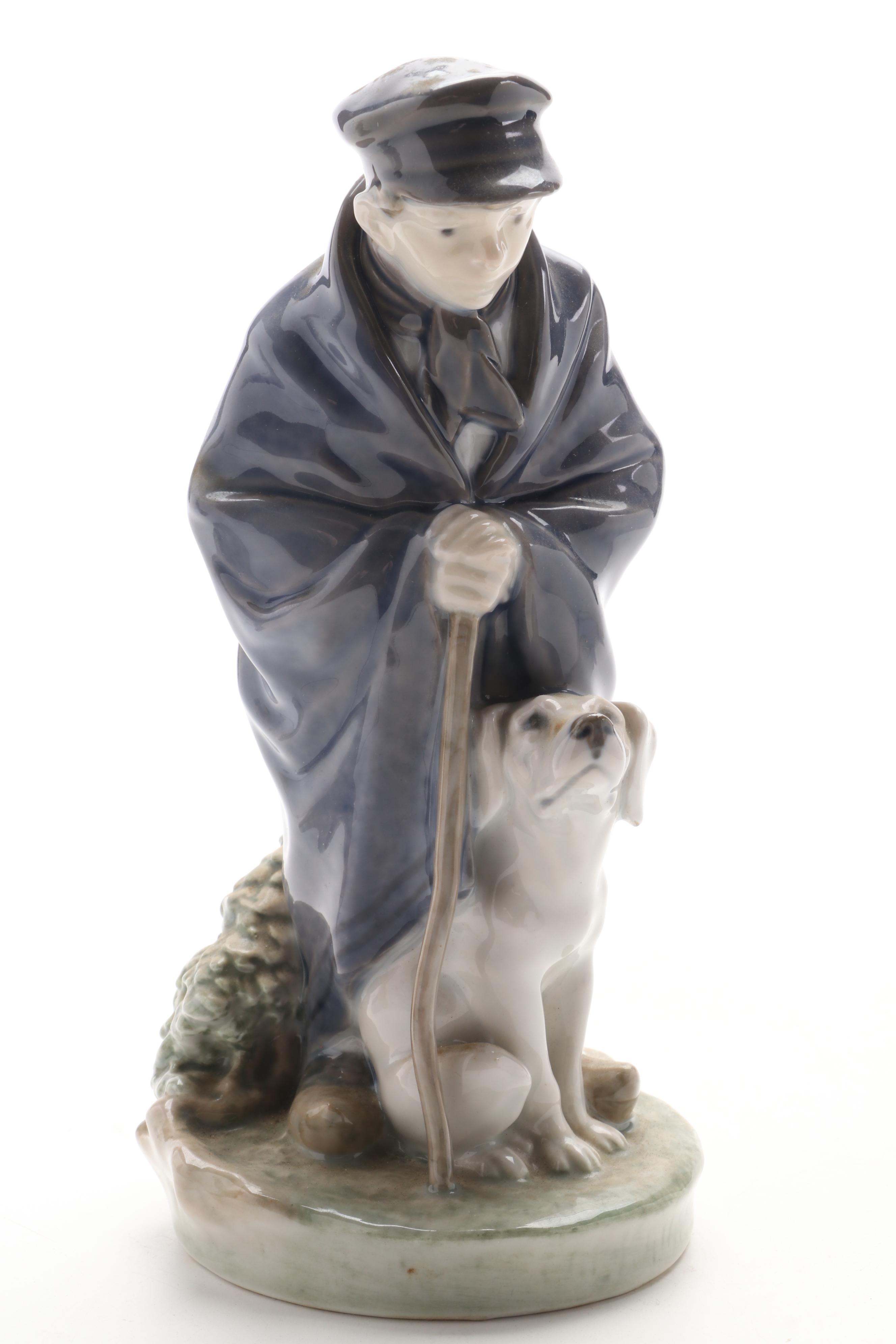 Royal Copenhagen Shephard Boy with Dog and Lladro Sailor Boy with Boat Figurines