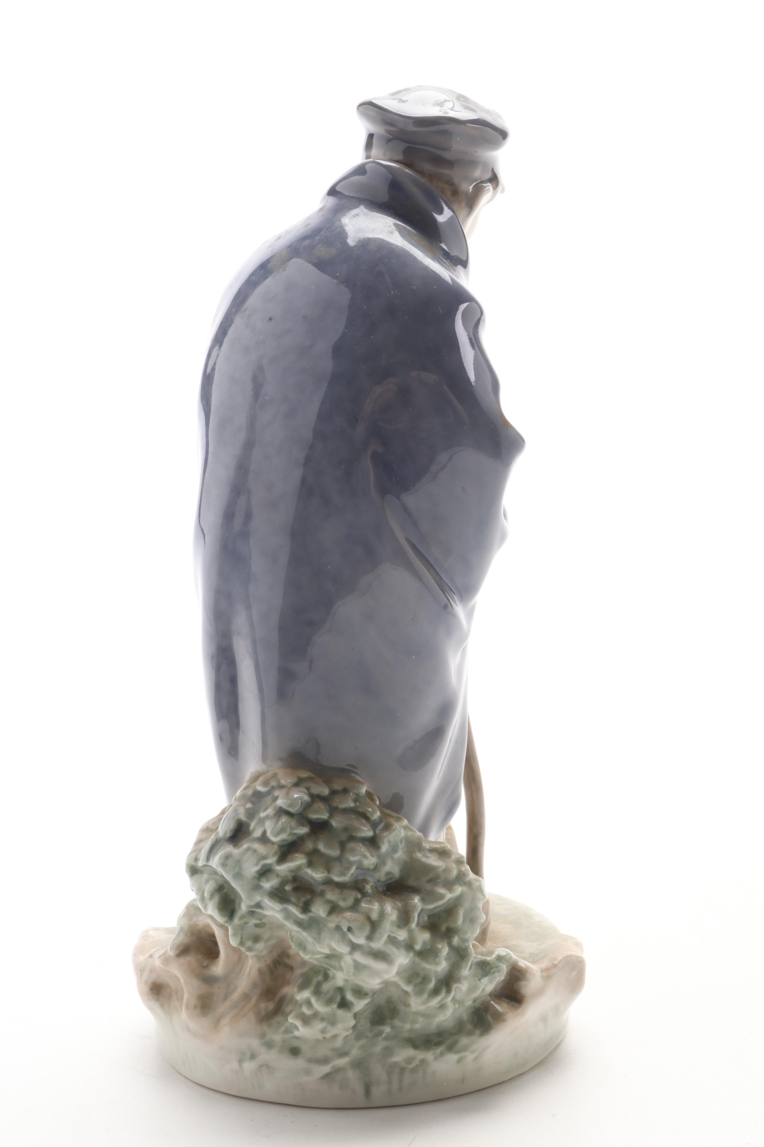 Royal Copenhagen Shephard Boy with Dog and Lladro Sailor Boy with Boat Figurines