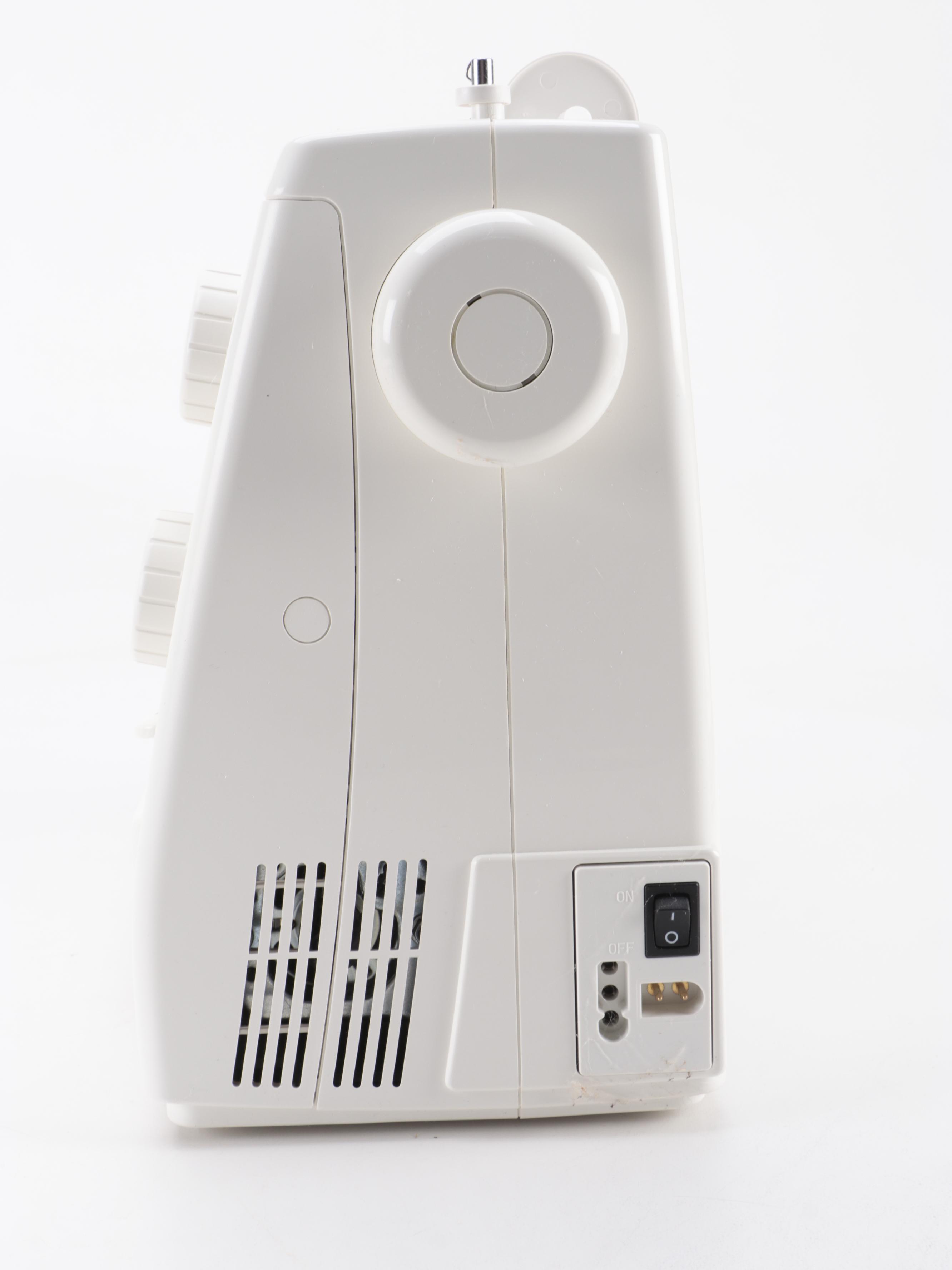 Janome Sewist 625E Electric Sewing Machine with Case and Accessories