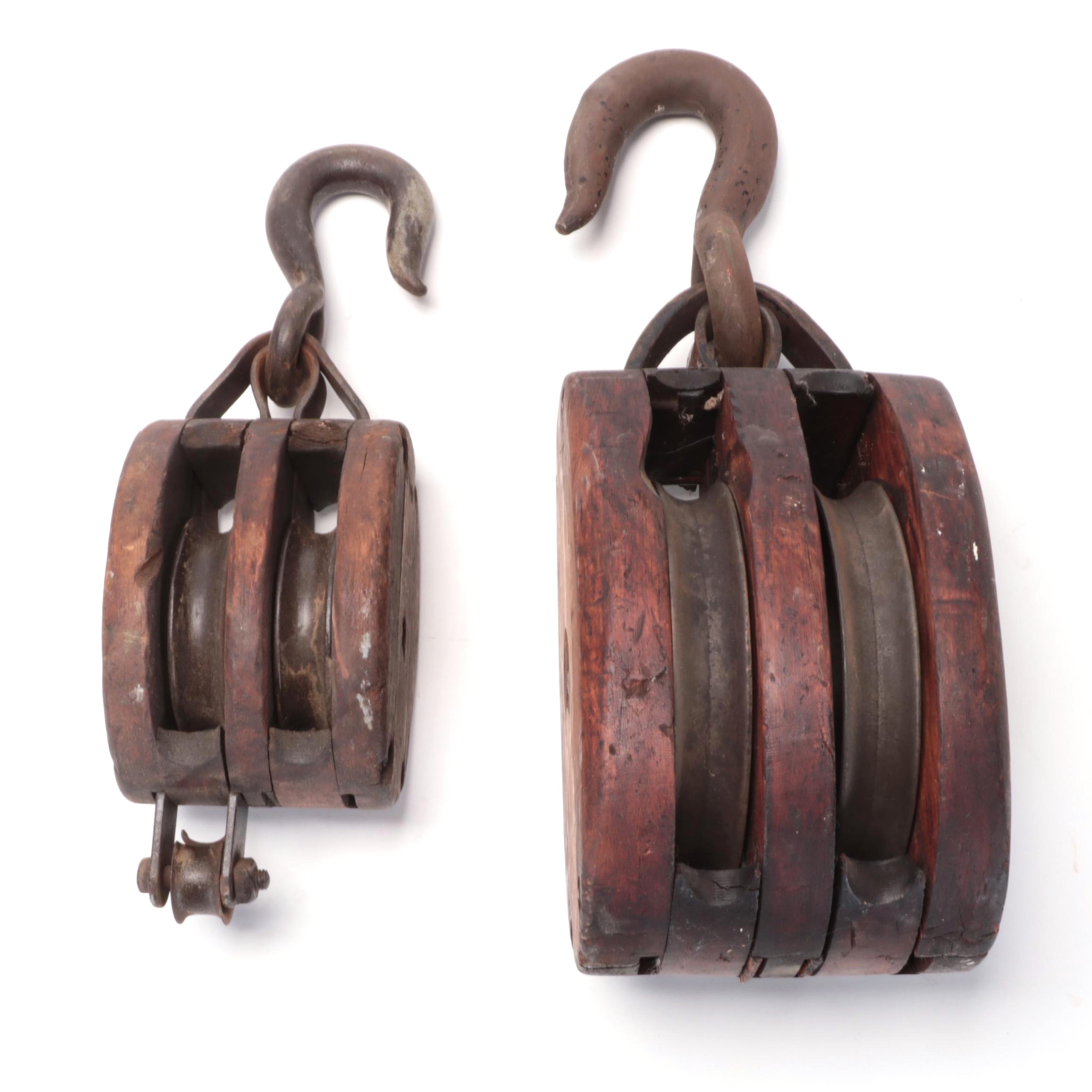Two Cast Iron and Wood Double Block Pulleys