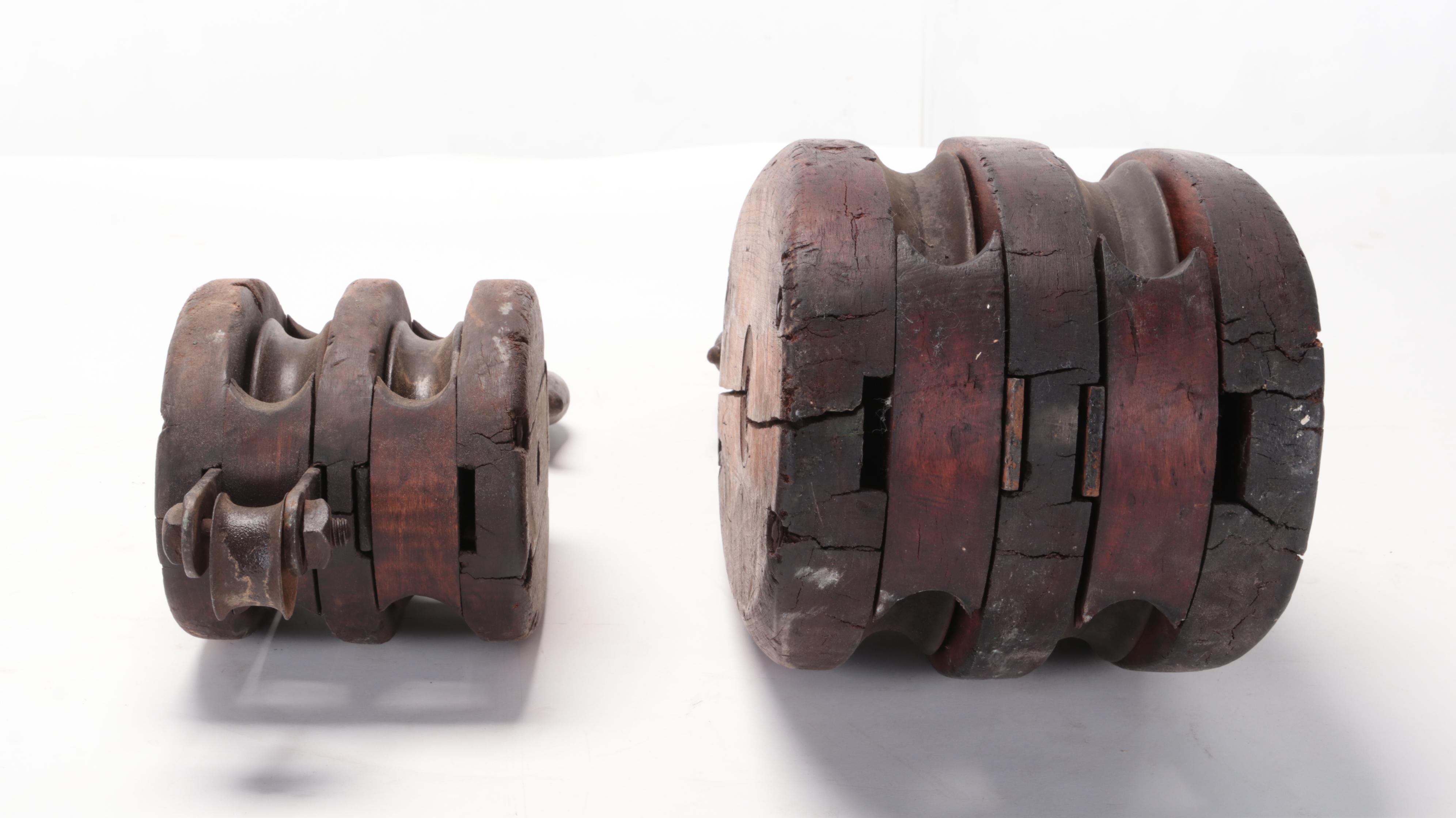 Two Cast Iron and Wood Double Block Pulleys