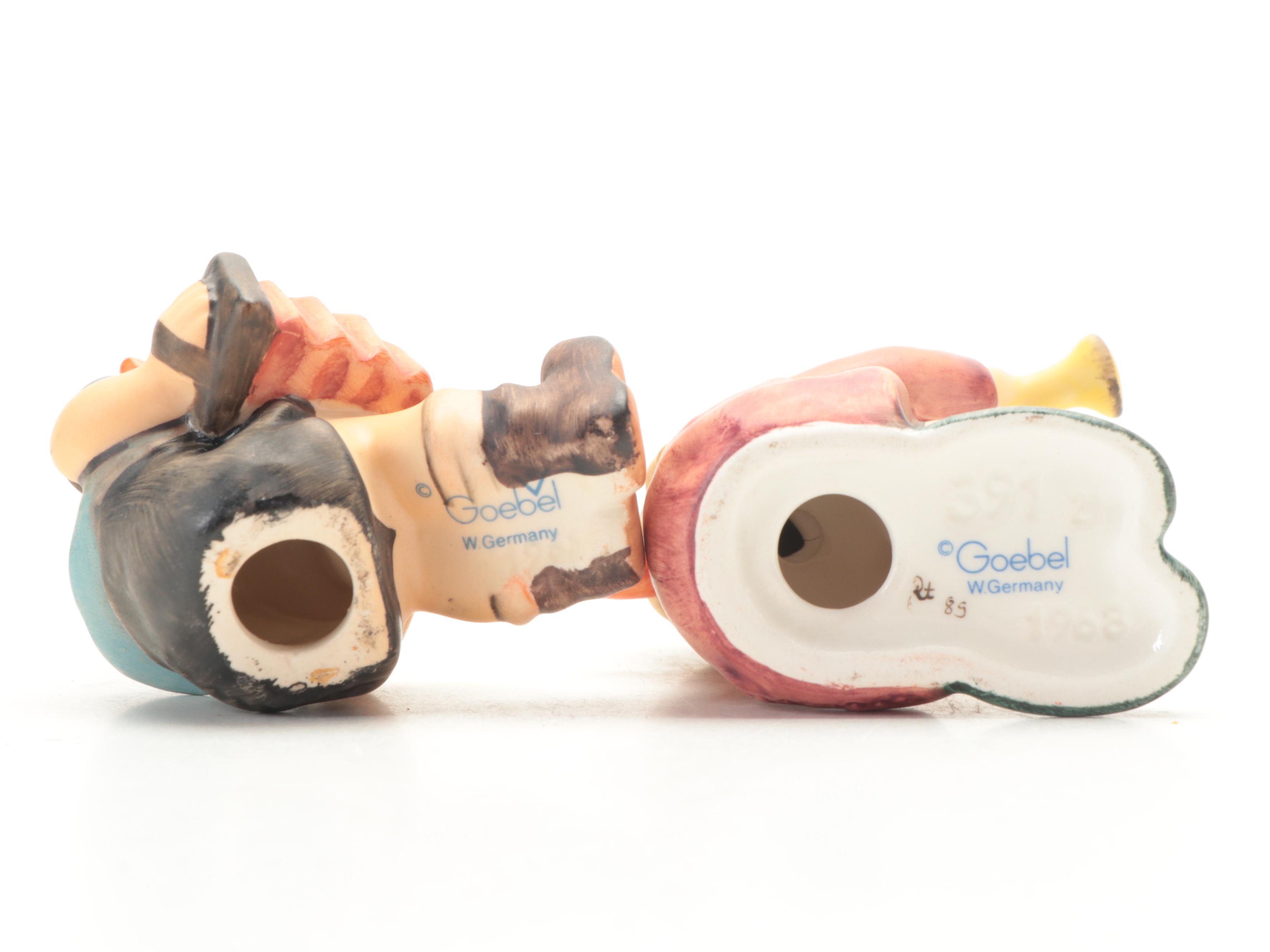 Anri Carved Music Box with Goebel Hummel and Other Porcelain Figurines