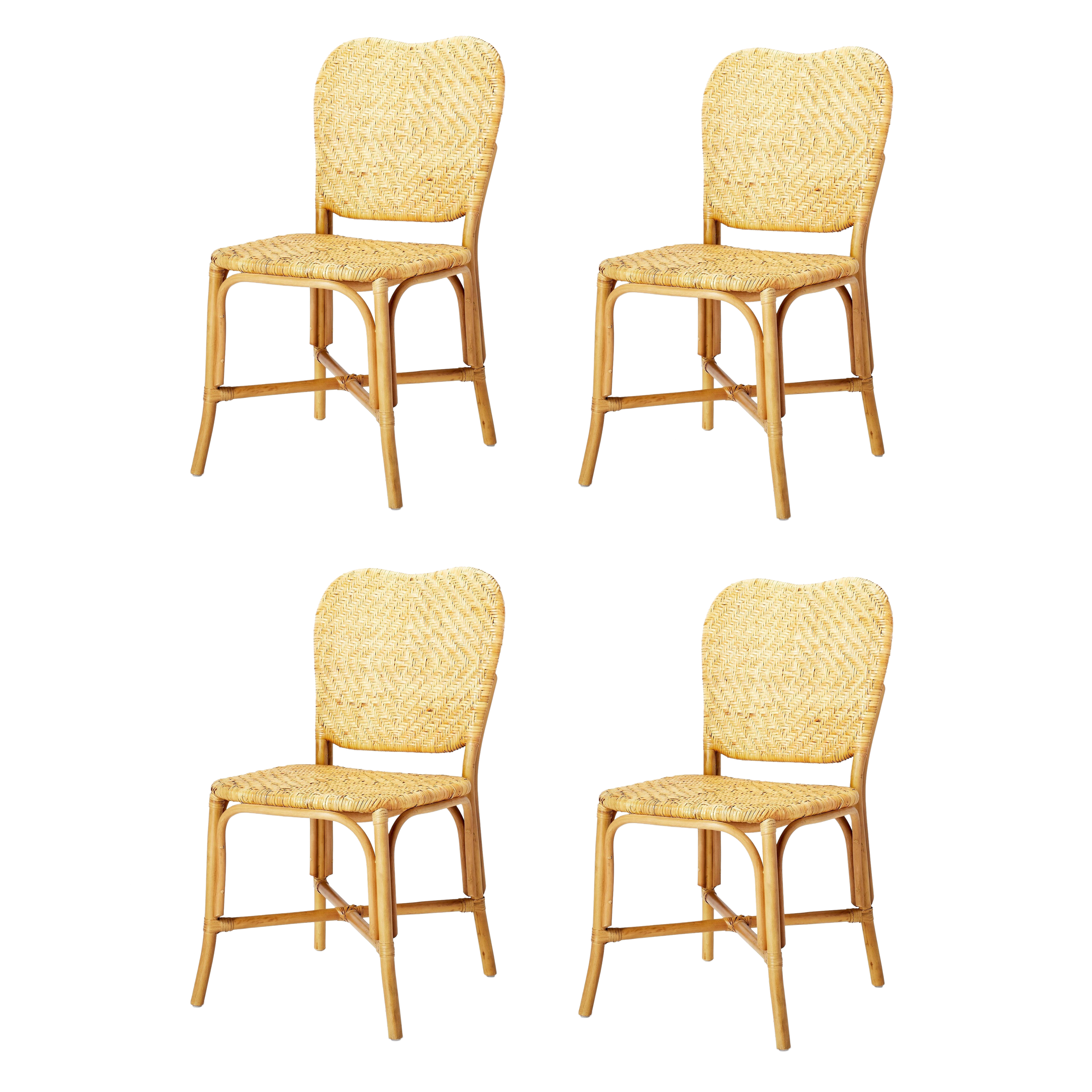 Set of Four Threshold with Studio McGee Interlaken Rattan Woven Dining Chairs