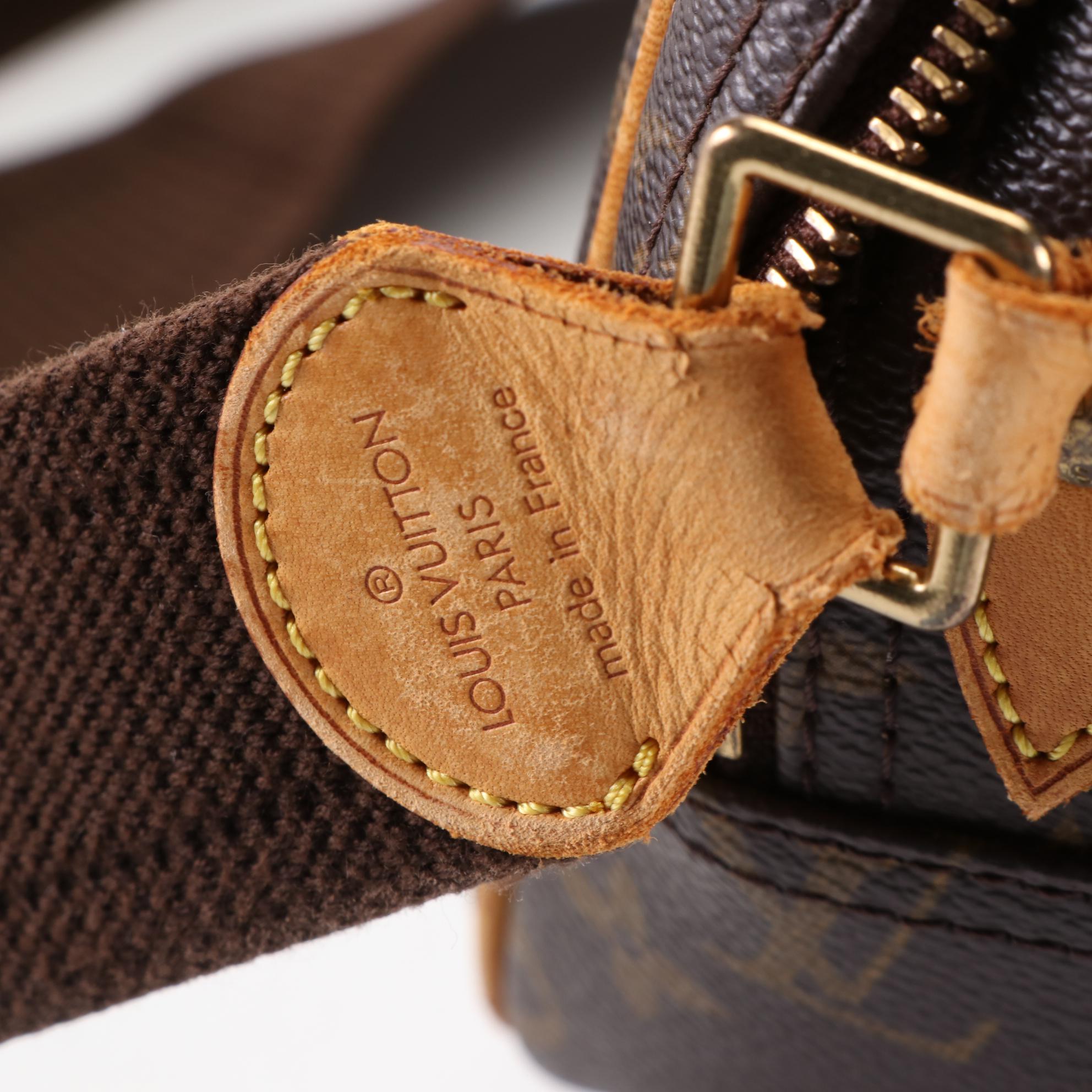 Louis Vuitton Reporter PM Bag in Monogram Canvas and Vachetta Leather