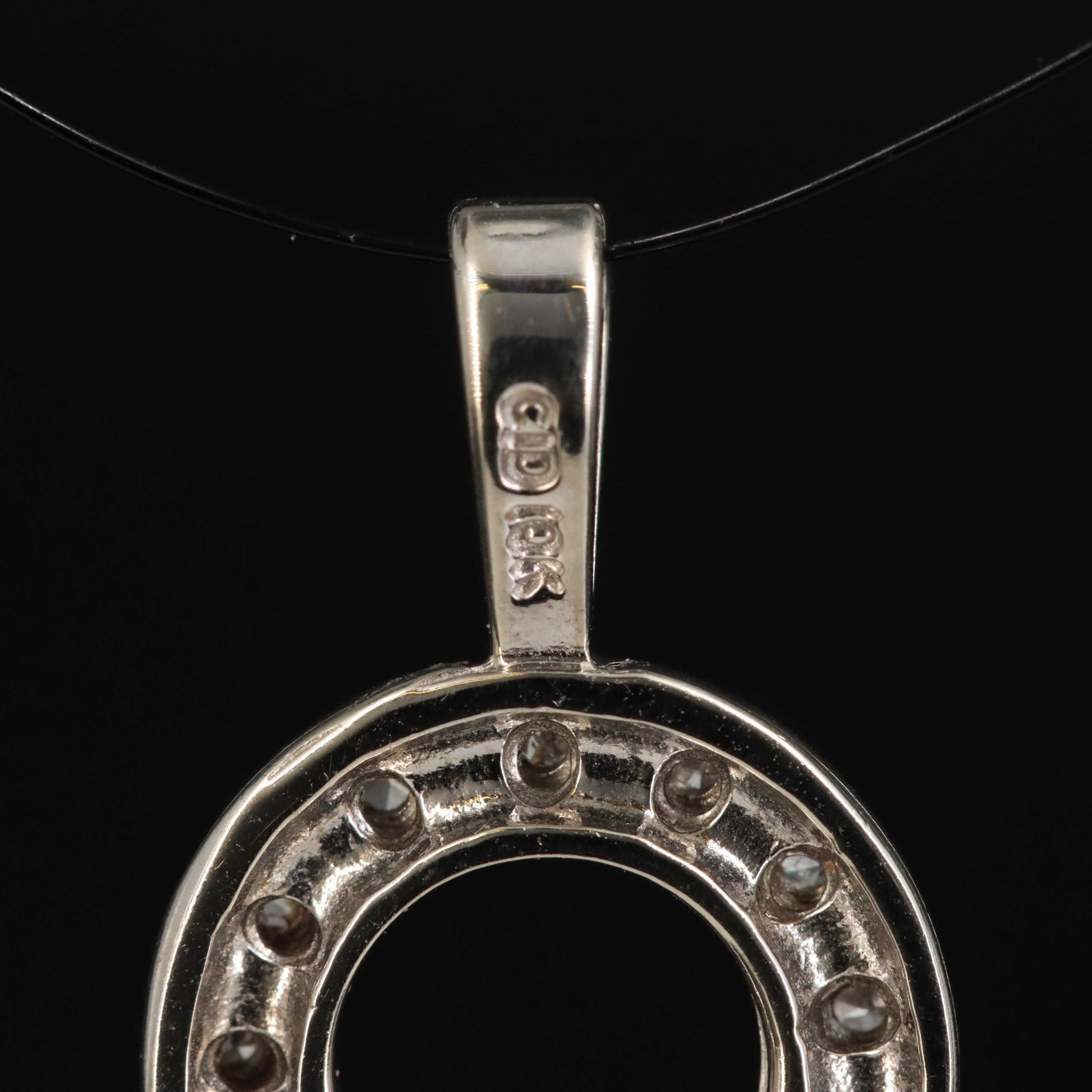 10K 0.20 CTW Diamond Circle Pendant