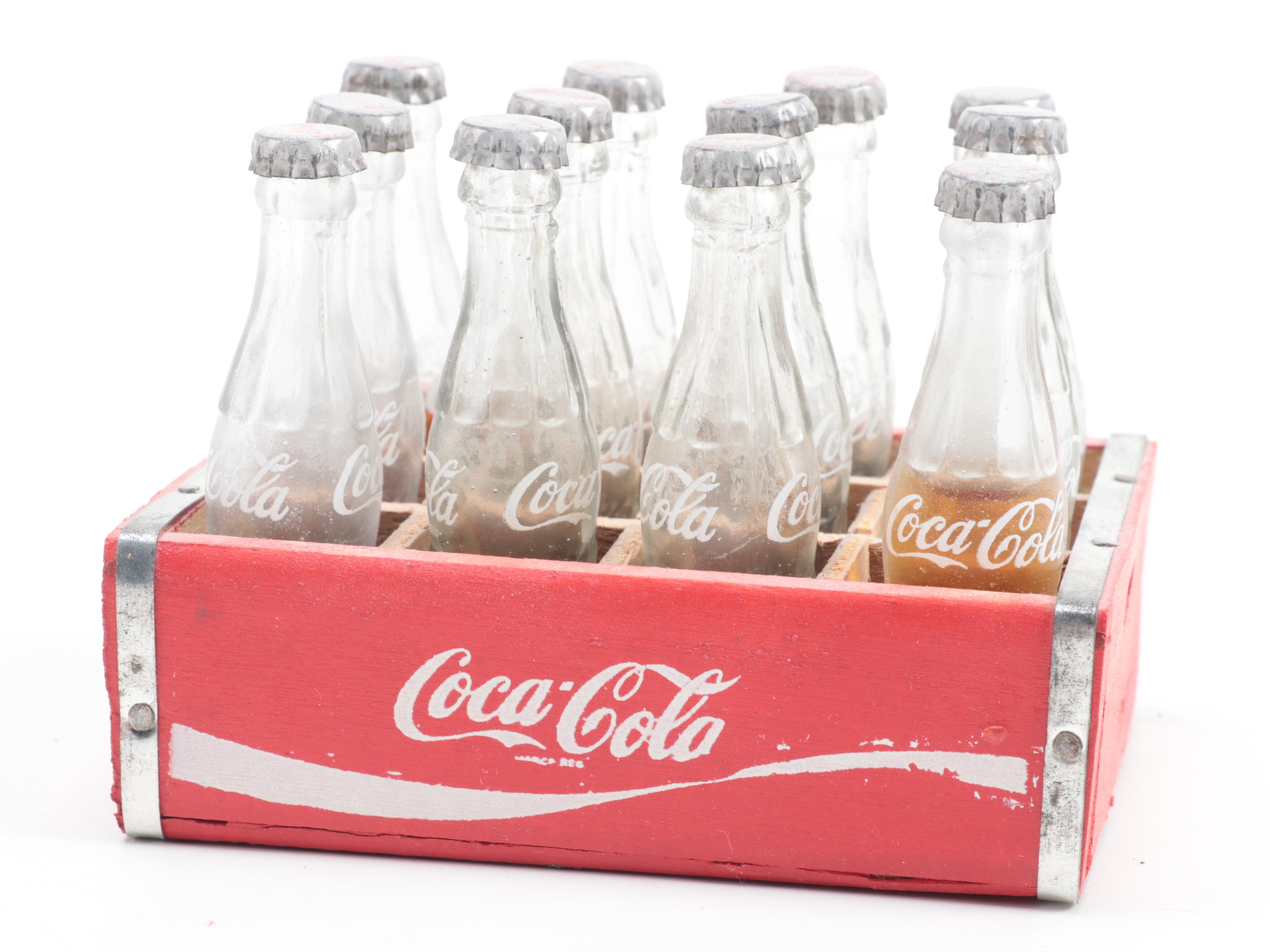 Coca-Cola Gumball Machine, Party Horns and Miniature Bottles with Crate
