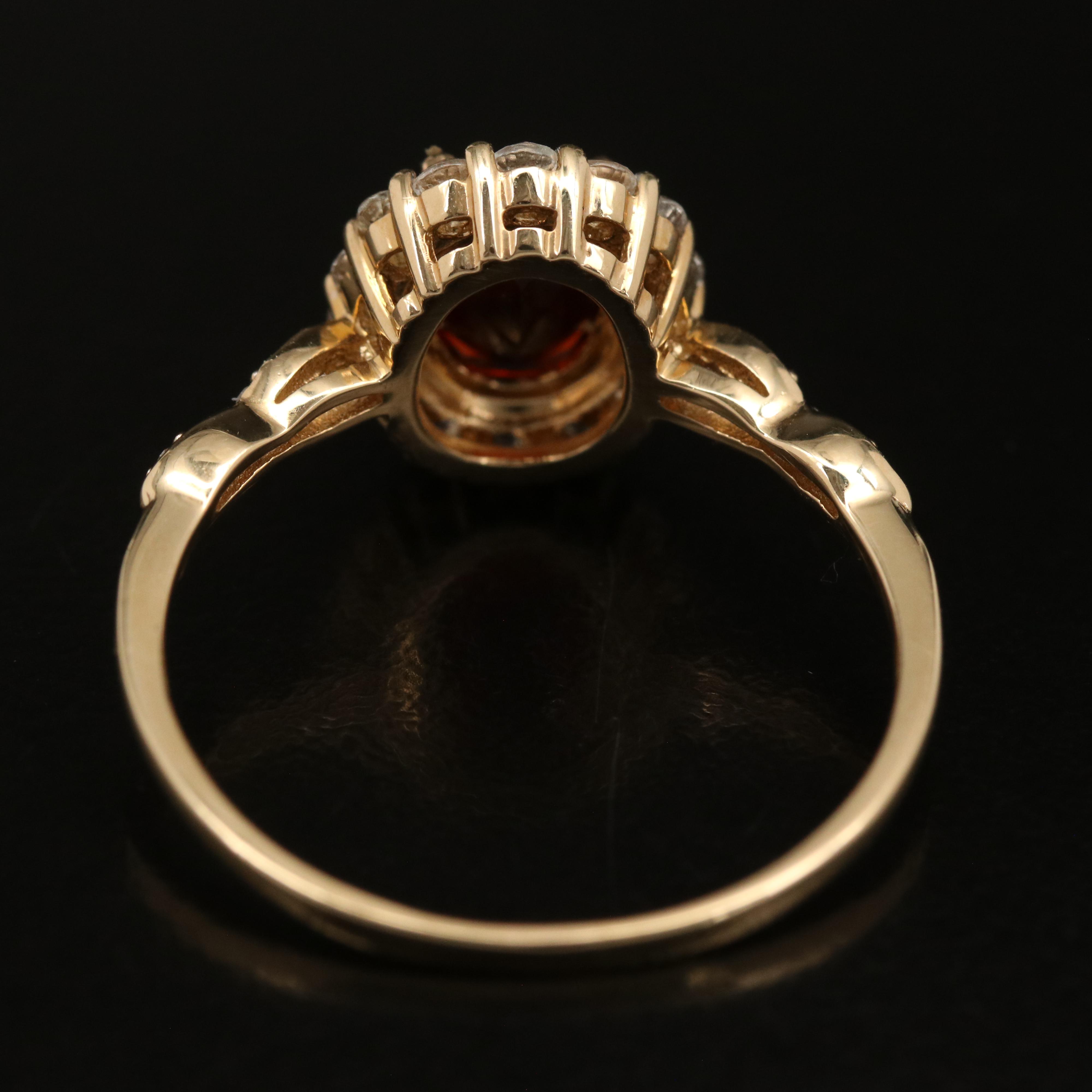 14K Garnet, White Topaz and Diamond Ring