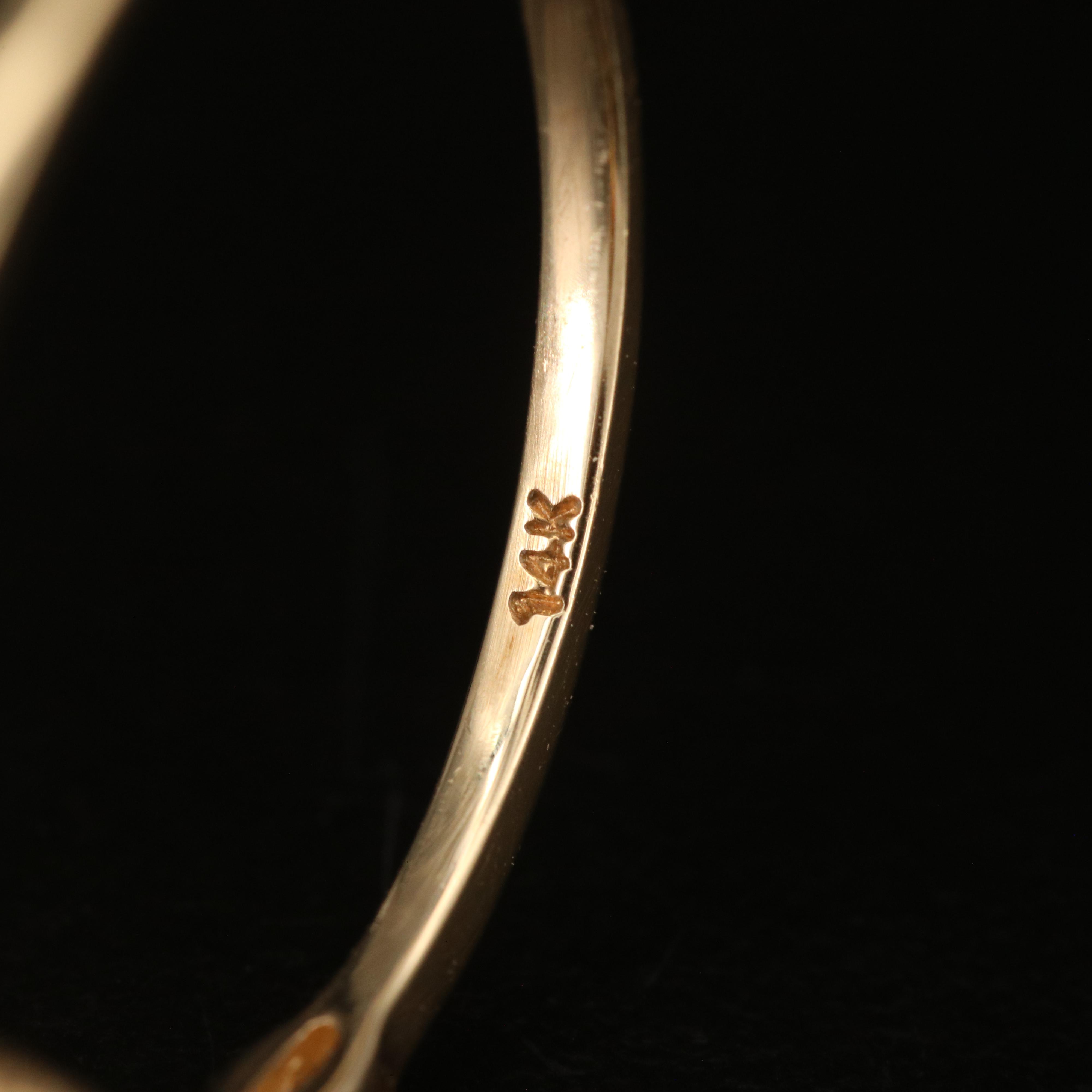 14K Garnet, White Topaz and Diamond Ring