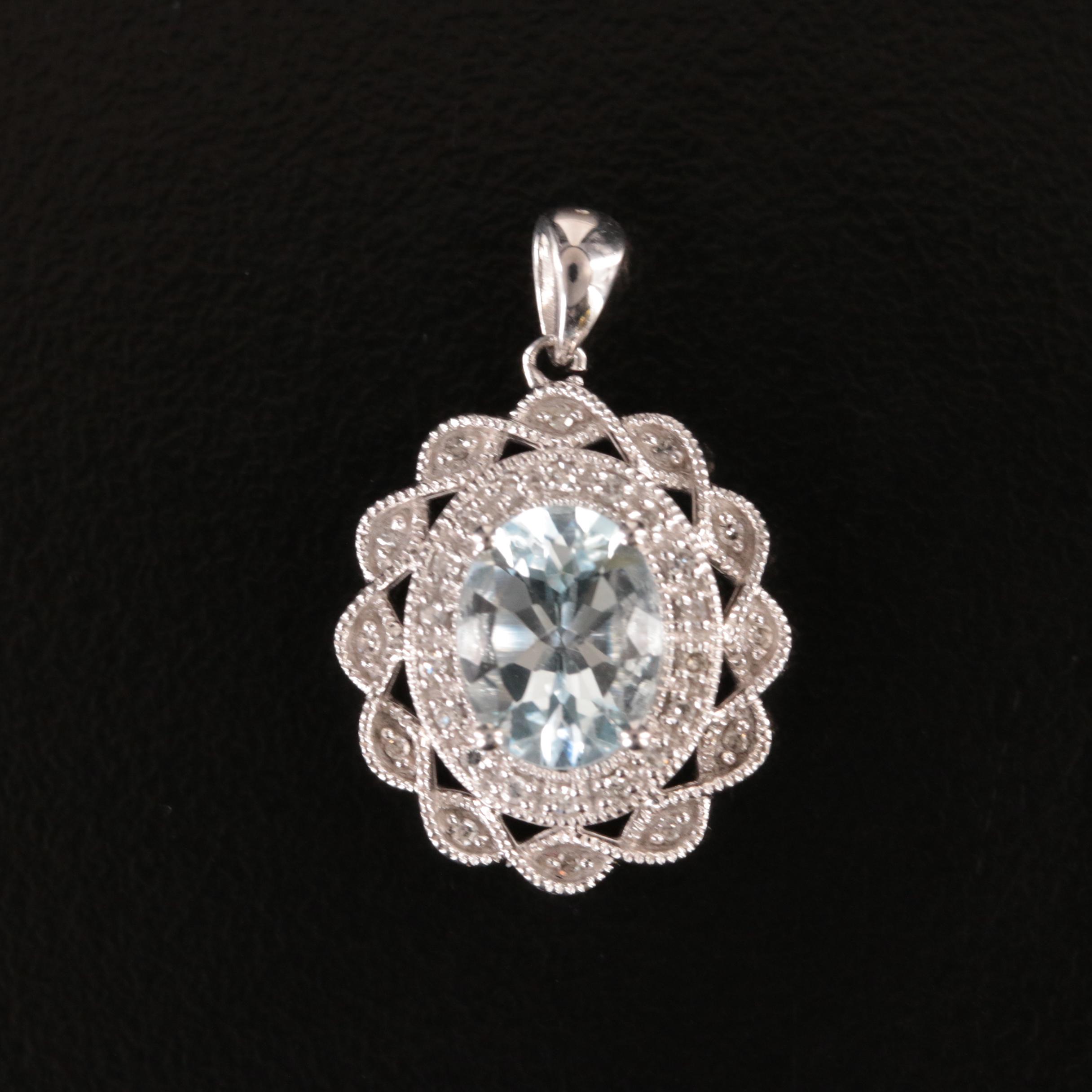 14K Aquamarine and Diamond Halo Pendant