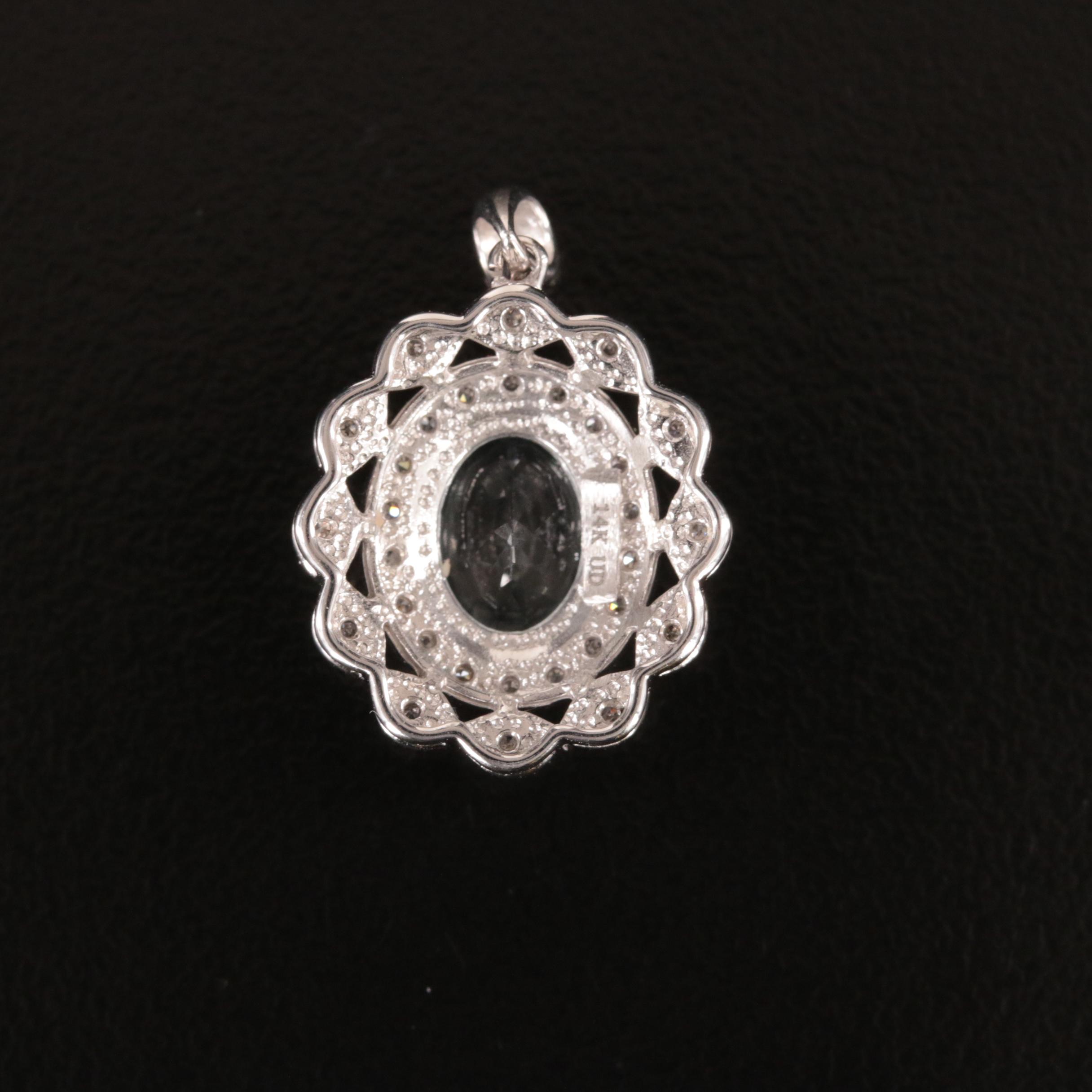 14K Aquamarine and Diamond Halo Pendant