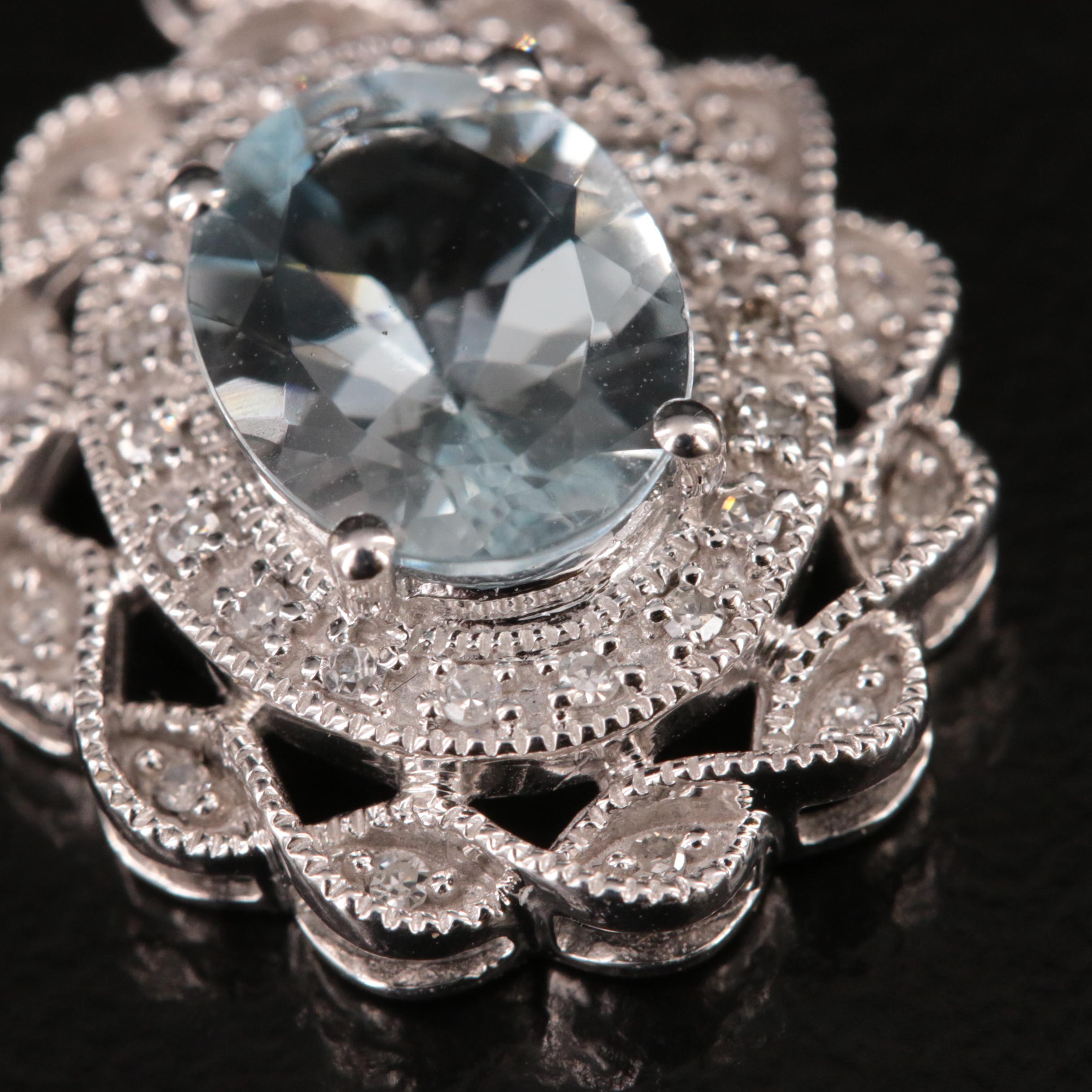 14K Aquamarine and Diamond Halo Pendant