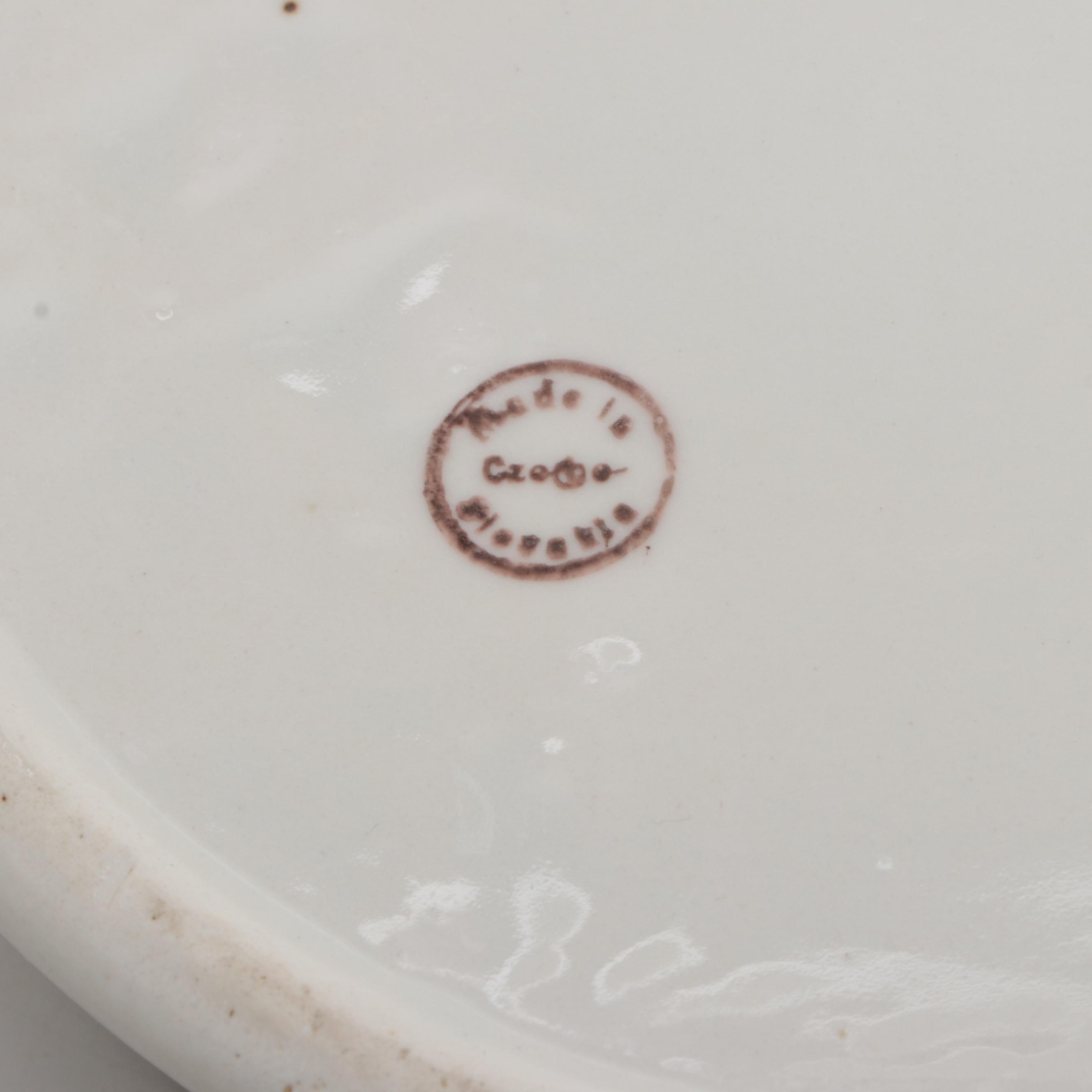 Amethyst Glass Jenny Lind Portrait Bottle with Other Ceramic Tableware