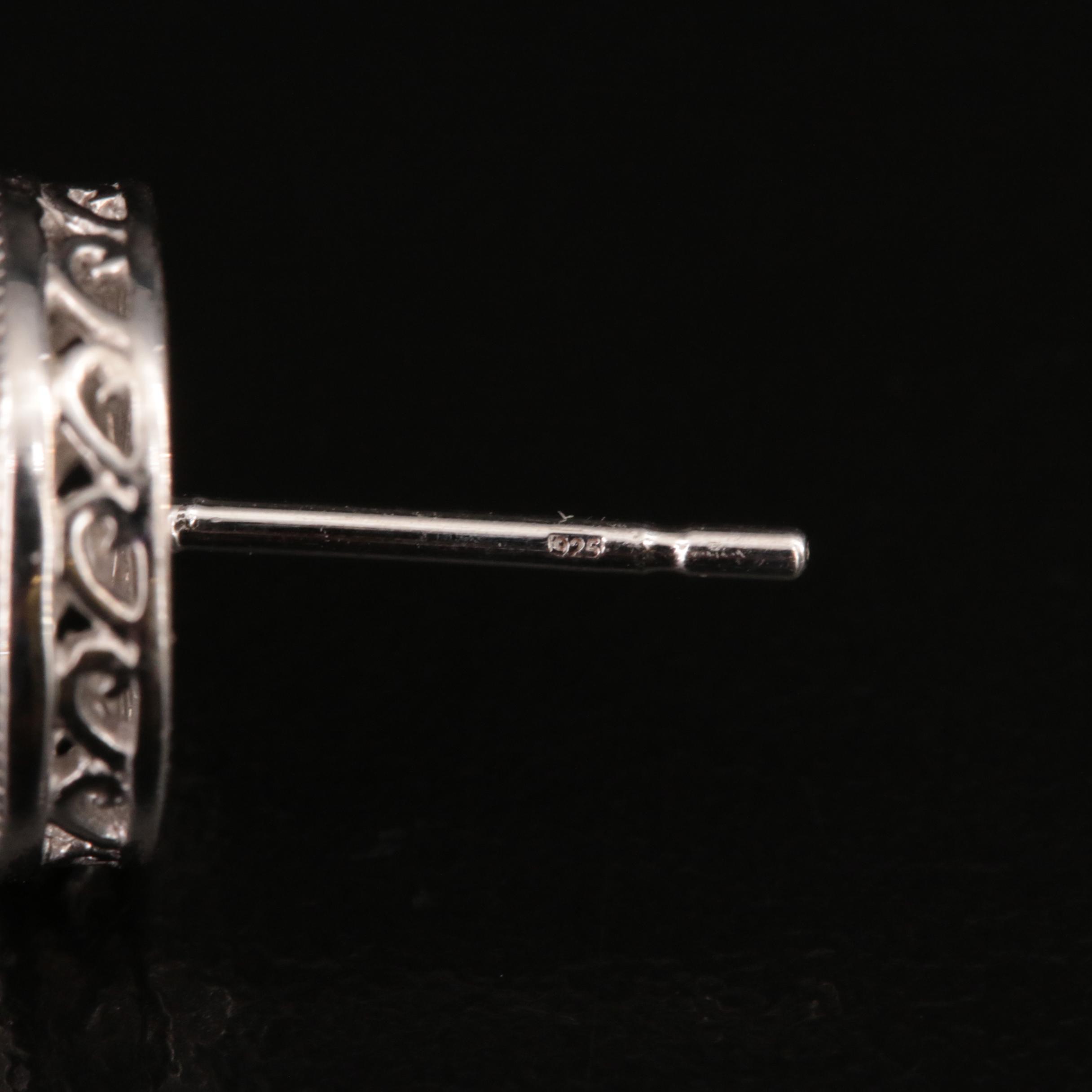 Sterling and Diamond Swirl Cluster Stud Earrings