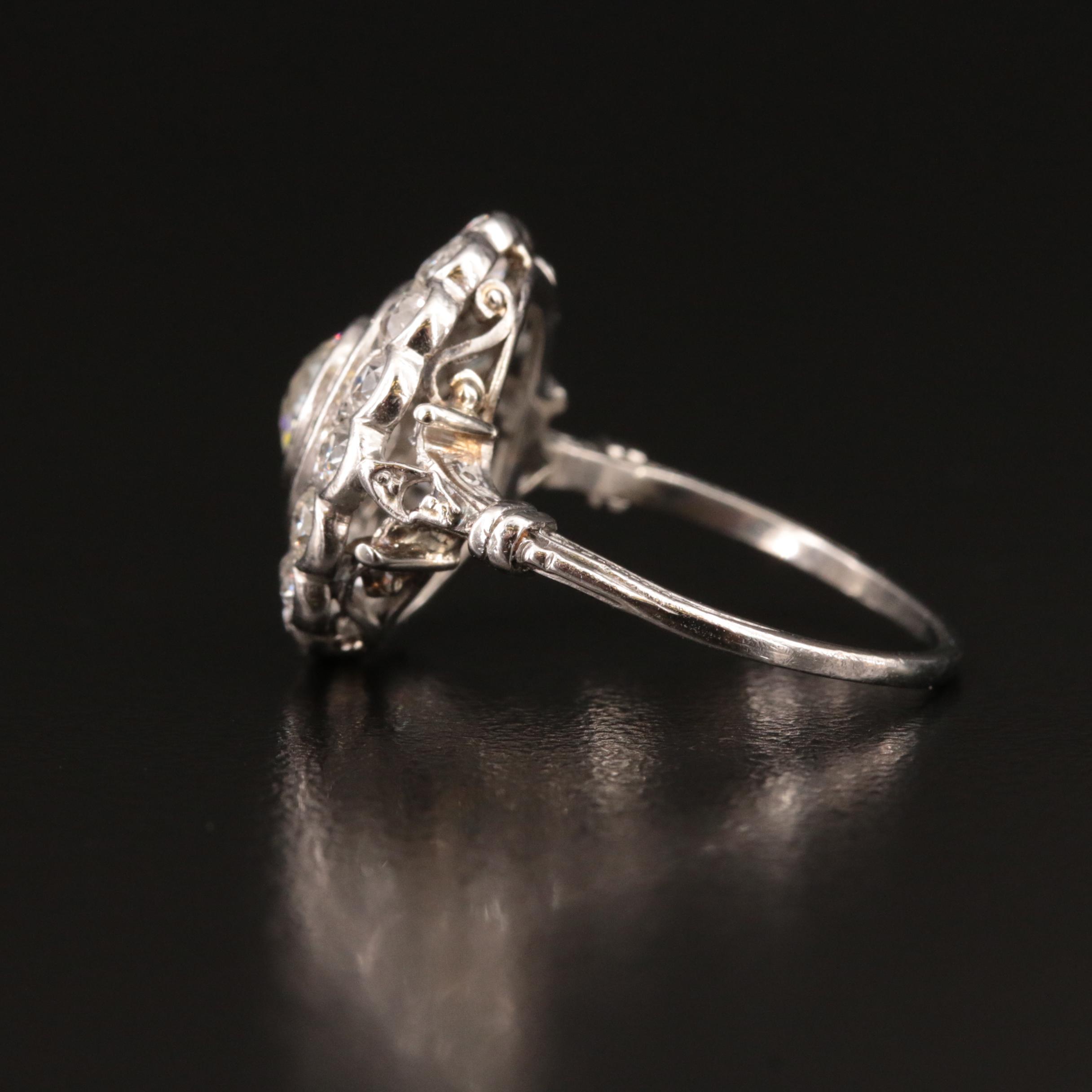 Vintage Platinum 2.08 CTW Diamond and Emerald Ring