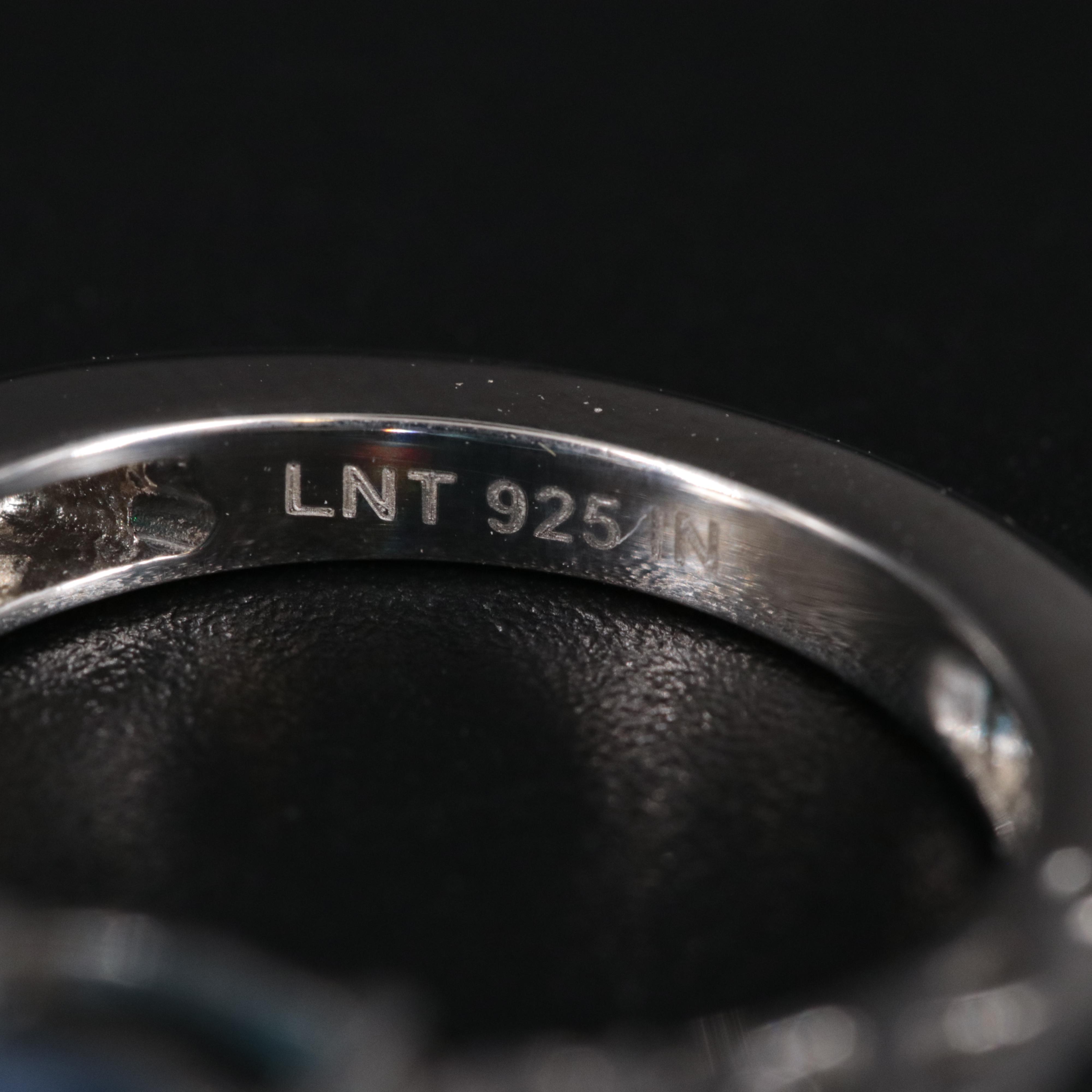 Sterling Silver Topaz and Cubic Zirconia Ring