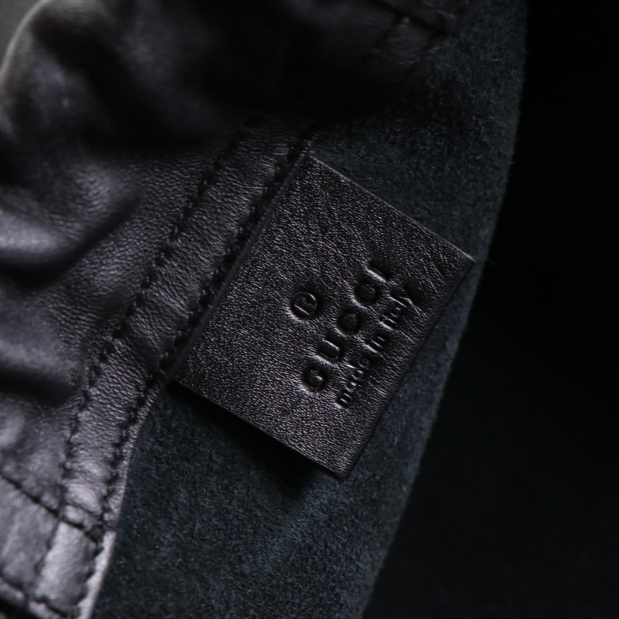 Gucci Drawstring Backpack in Printed Black Leather w/Zip Pouch