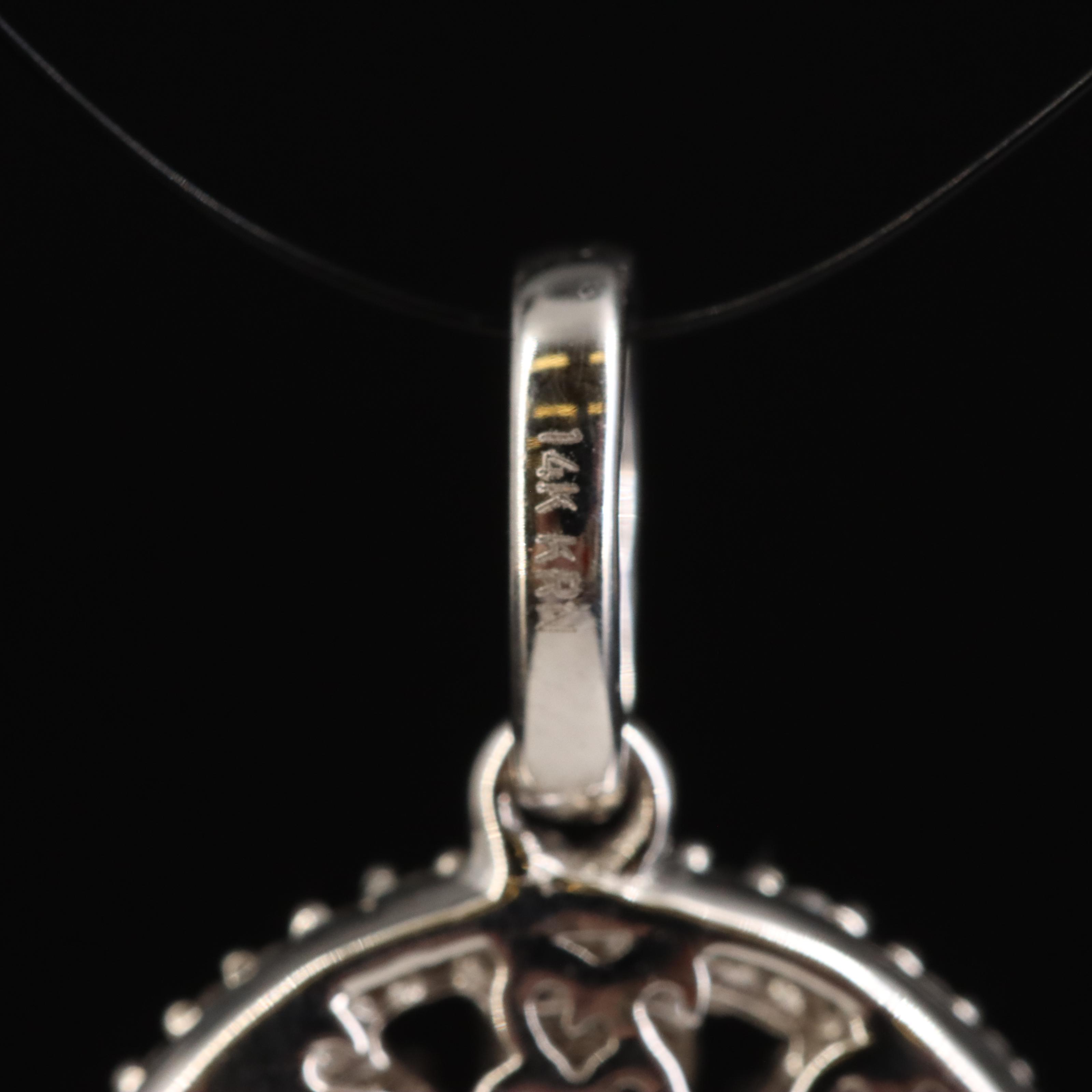 14K 0.71 CTW Diamond Pendant