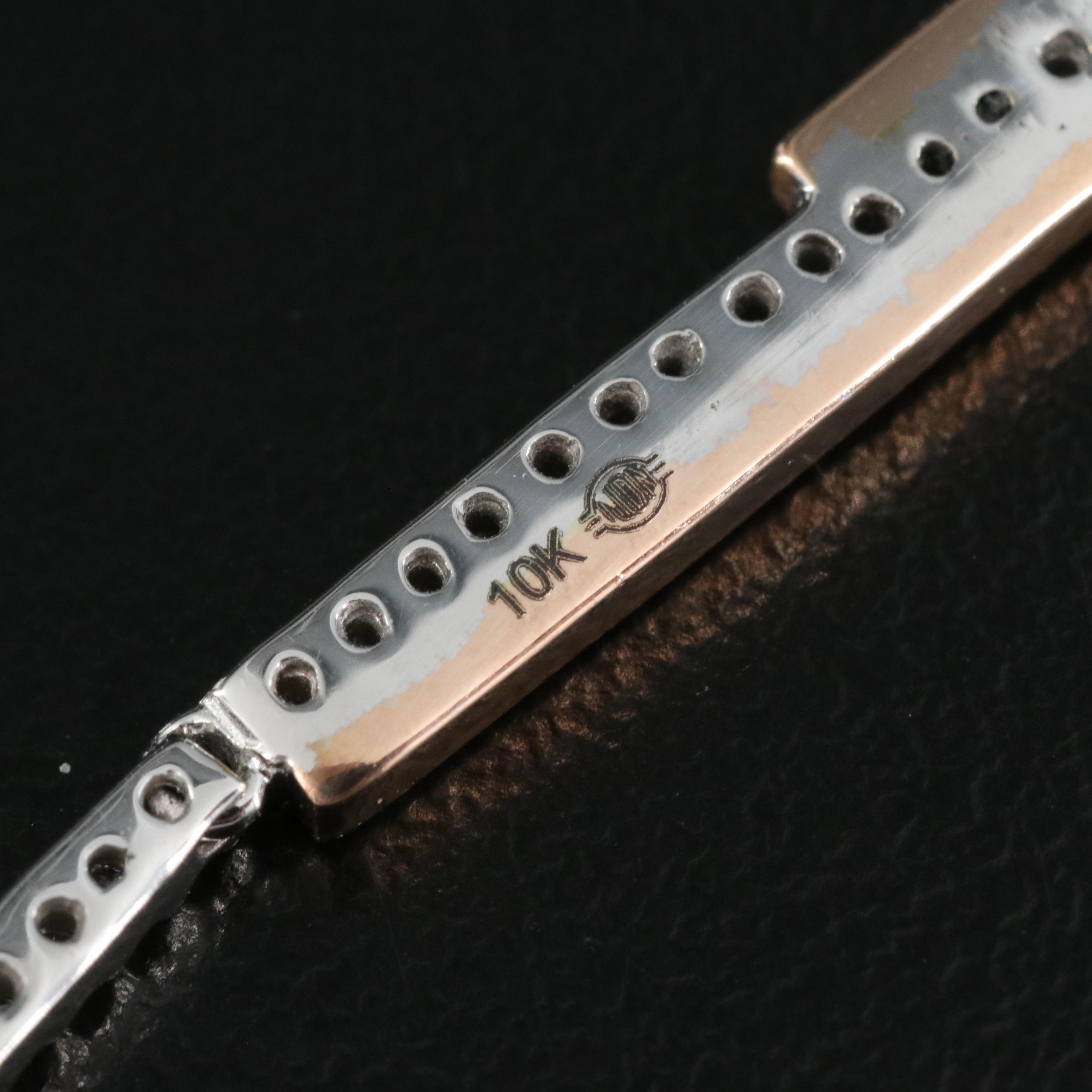 10K 0.33 CTW Diamond Earrings with Rose Accents