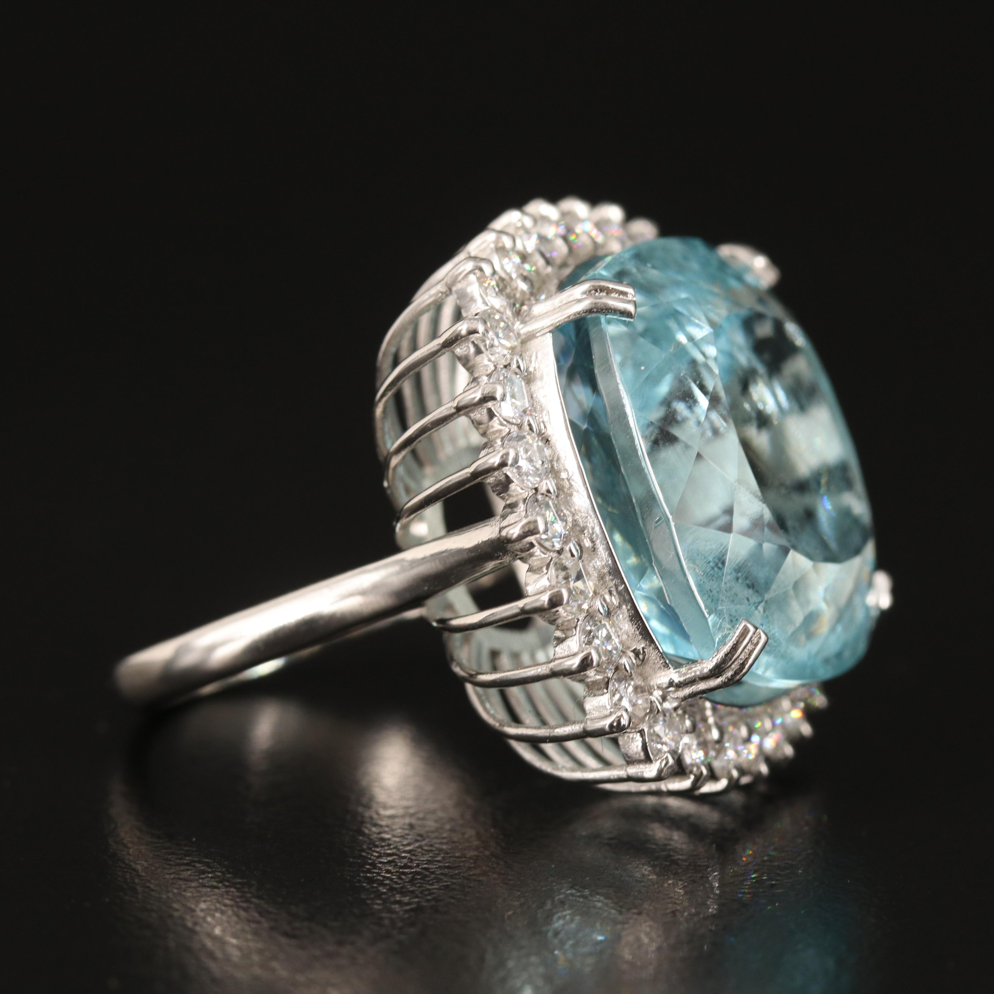 Platinum 37.97 CT Aquamarine and 1.54 CTW Diamond Ring