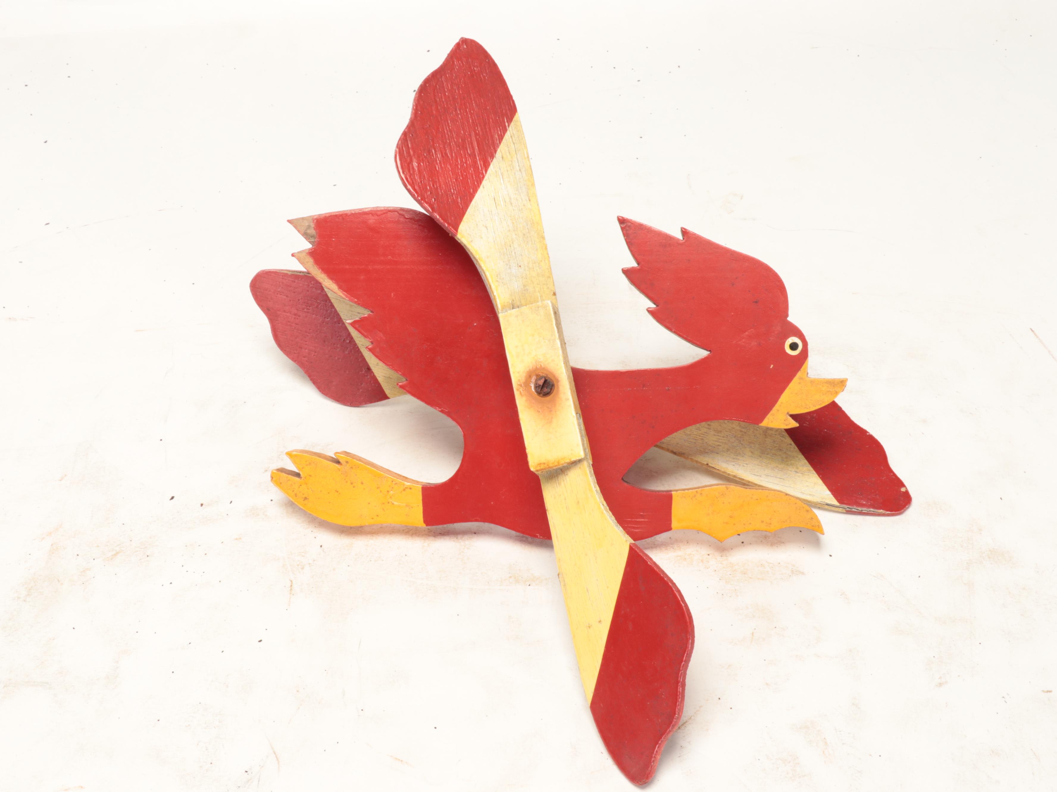 Painted Cutout Metal Dolphins with Kinetic Rooster