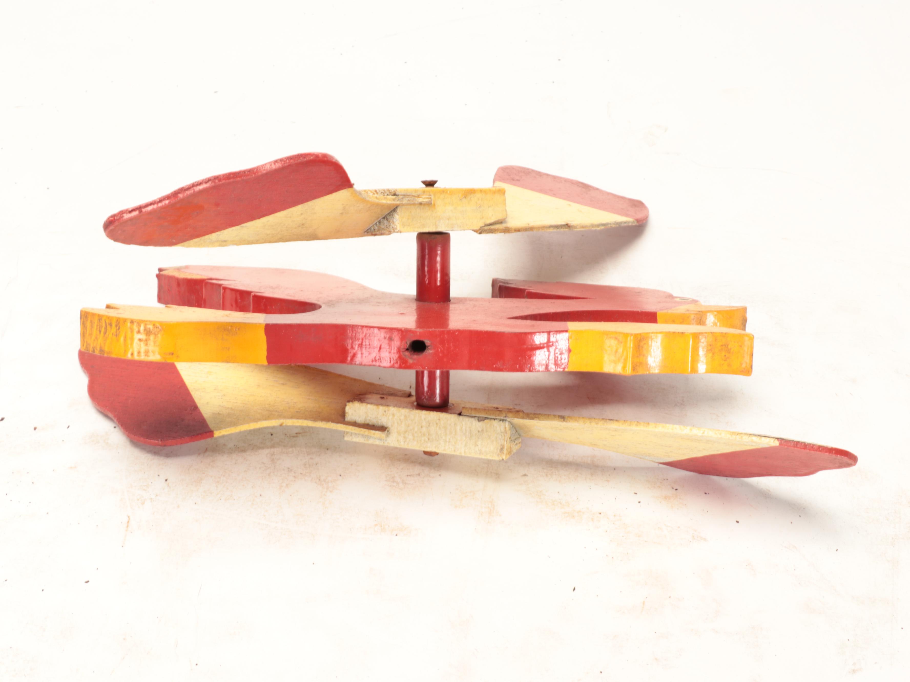 Painted Cutout Metal Dolphins with Kinetic Rooster