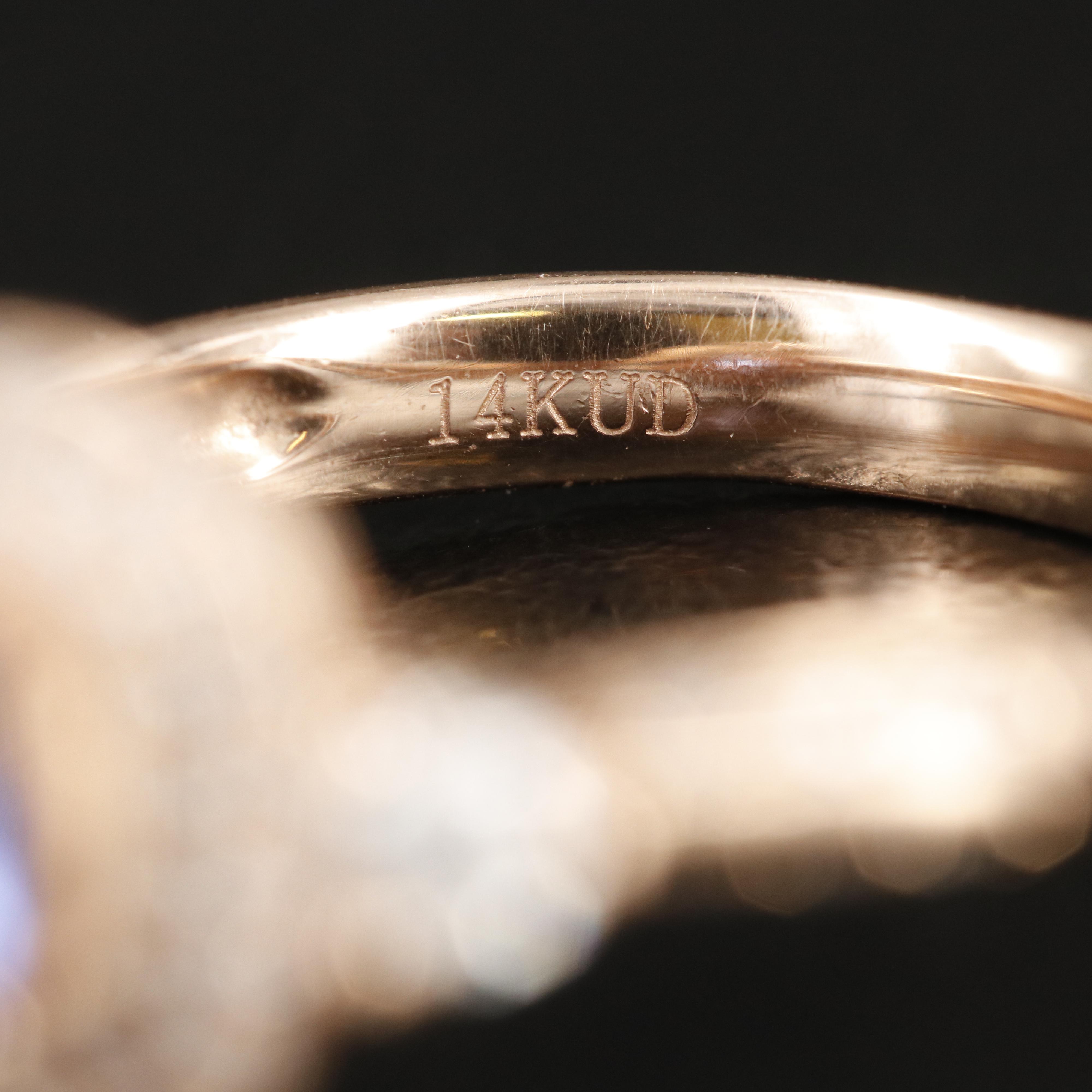 14K Rose Gold Tanzanite and Diamond Ring