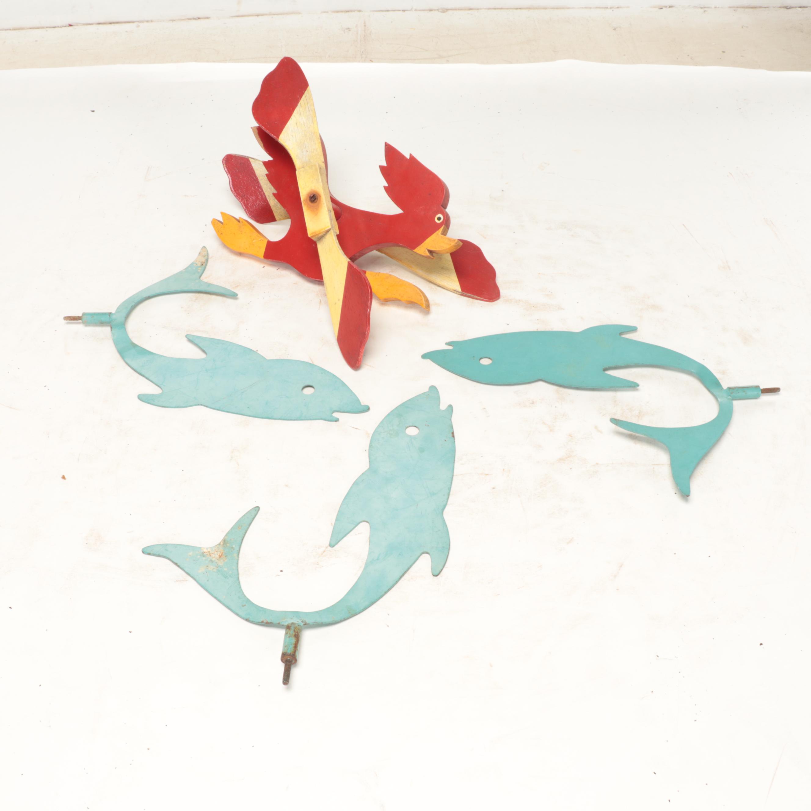 Painted Cutout Metal Dolphins with Kinetic Rooster