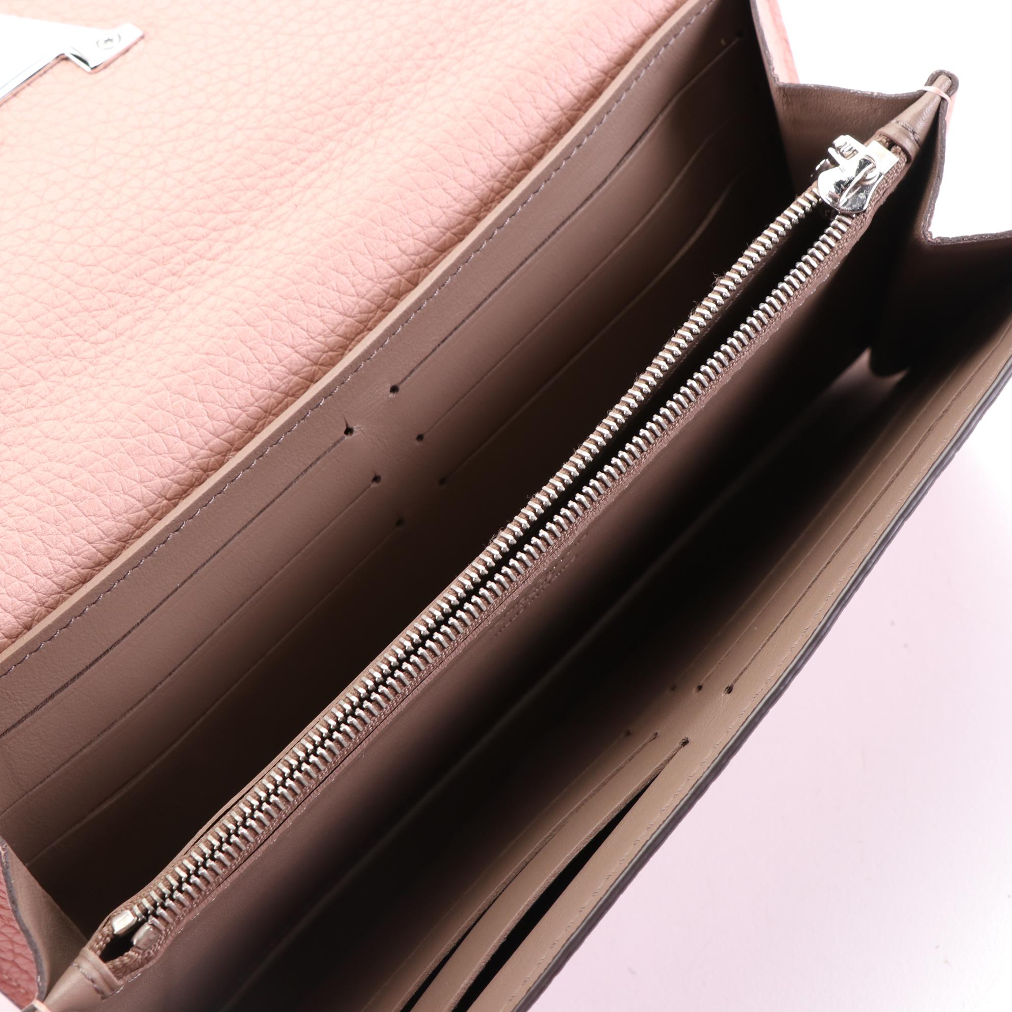 Louis Vuitton Capucines Logo Wallet in Grain Leather