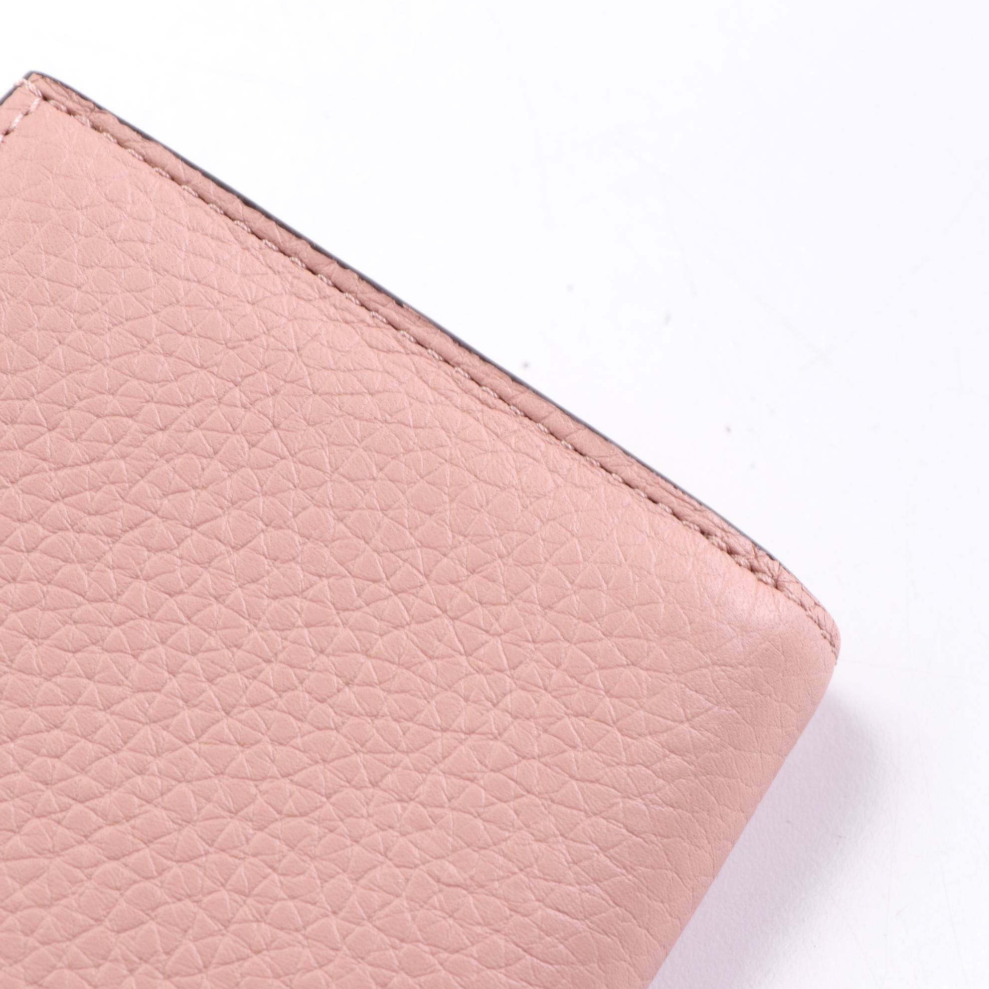 Louis Vuitton Capucines Logo Wallet in Grain Leather